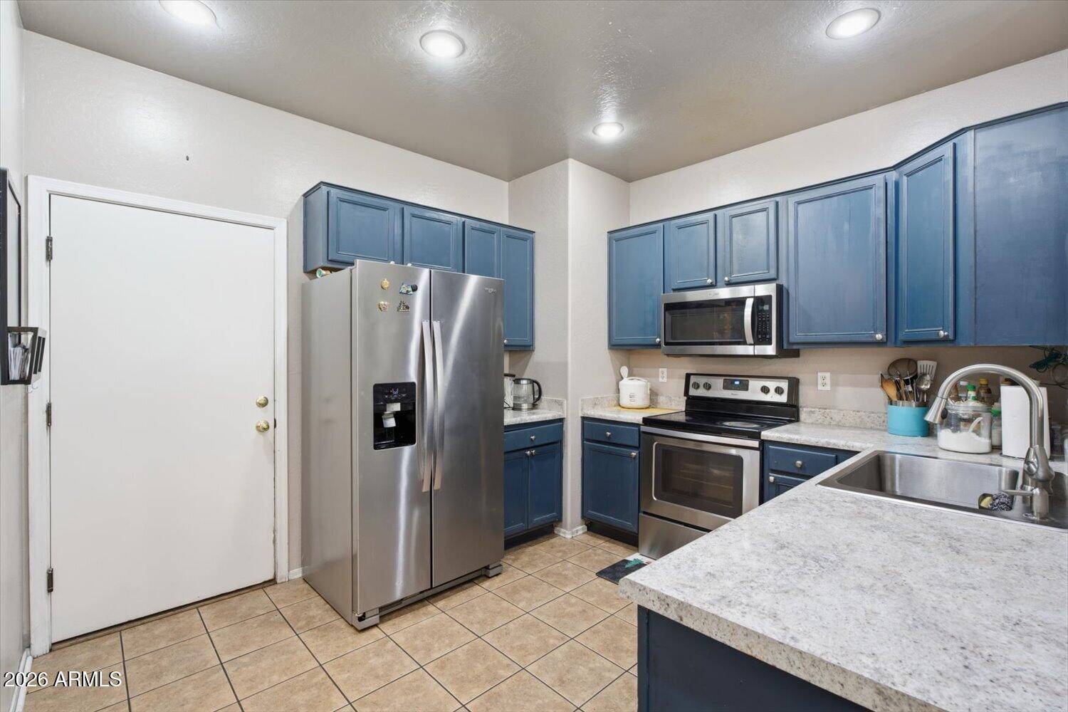 Move in ready in a charming, well maintained gated community. This 3 bedroom, 2.5 bath townhome welcomes you with a private gated front courtyard and features one of the community's most desirable floor plans. The open concept living and dining area flows into a spacious kitchen with stainless steel appliances and abundant cabinet storage. A convenient powder room is downstairs. Upstairs, the spacious primary suite offers a private balcony, en suite bath, and two walk in closets. Both secondary bedrooms also feature walk in closets, and the upstairs laundry room adds everyday convenience. An attached 2 car garage completes the home.
Enjoy community amenities including a pool, spa, and playground, all in an unbeatable Mesa location with quick freeway access. Just minutes from ASU, Banner Baywood Medical Center, shopping, dining, parks, entertainment, and multiple golf courses. Perfect as a primary residence, winter retreat, or investment property.