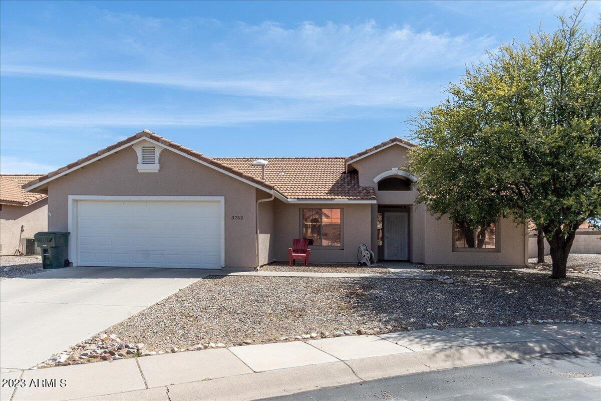 Check out this lovely 3 bedroom, 2 bathroom home located in the sought after Canyon De Flores neighborhood.  Tile in all living areas, carpet only in bedrooms.  Split floor plan granting the owner's bedroom privacy from secondary bedrooms. Kitchen features large eat in area that will easily fit a large dining table.  Spacious living area. Mature trees on property, sits tall above neighbors behind.  New AC and furnace installed in 2020!