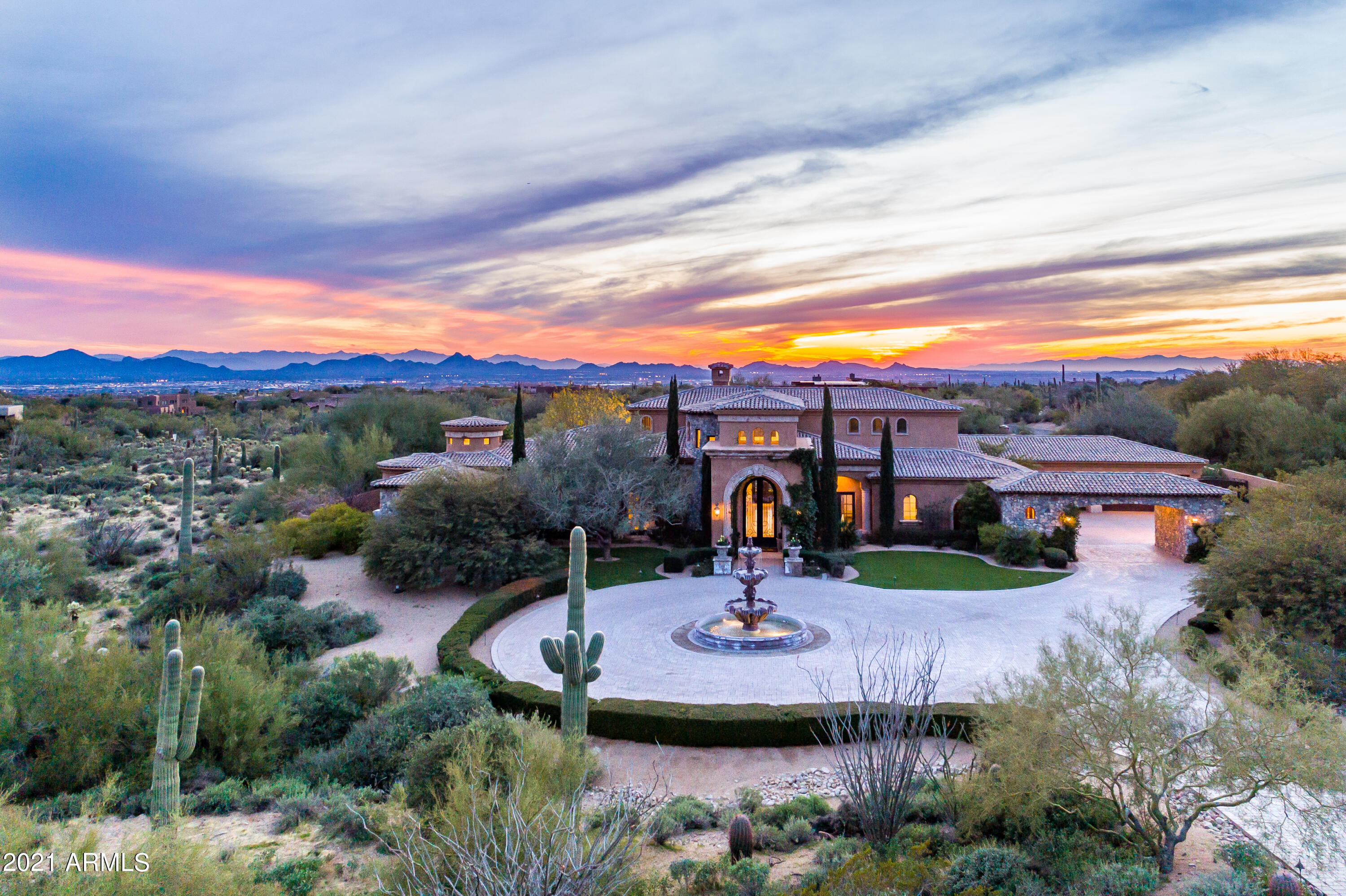 Exclusive ''Canyon Heights'' subdivision. Premiere gated community with amazing custom homes on multi acre home sites offering true privacy and expansive mountain and city views. Built in 2008 and fully updated in 2017, this elegant home offers grand scale design and appointment while maintaining a warm and intimate feeling. Modern concept floorplan includes gourmet equipped kitchen open to large family room. 4 bedrooms, plus office, studio, game room and movie theater. Regal master suite with private patio, sitting room and spa like master bath. ''Her'' closet is a must see. See photo report for more details. Shown by appointment only! Advance notice required.