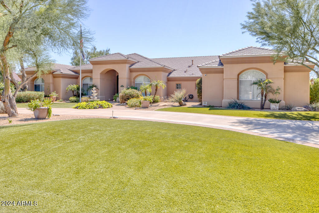 Welcome to your very own paradise! This luxury, move-in ready home offers 5 oversized bedrooms and 4 bathrooms with the 5th bedroom currently being used as an office. This Control4 smart home features a newly remodeled kosher kitchen with a large walk-in pantry. The spacious formal living area, cozy lounge/game room, and the grand dining room that can accommodate at least 20 guests makes for an entertainer's dream. The expansive backyard is home to citrus trees, a fresh herb garden, fire pit, spa, and a newly redone pool. Paradise Valley living at its finest!