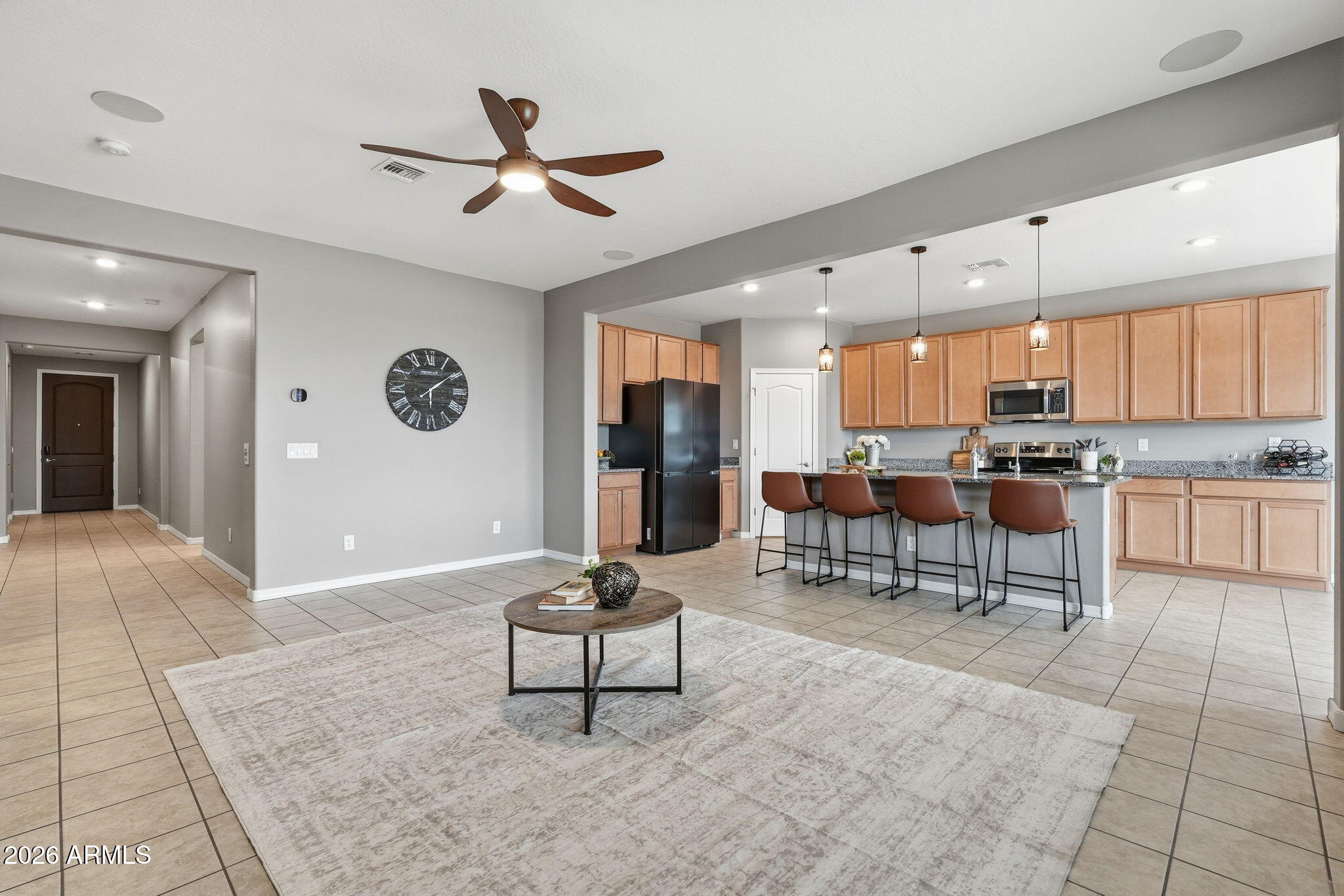 Welcome to Verrado..where tree-lined streets and an unmatched lifestyle await. This move-in ready, single-level home built in 2021 features 3 bedrooms, 3 bathrooms, and a smart split floorplan that gives everyone their own space. The open-concept kitchen and living area is perfect for gathering, while the primary suite offers a peaceful retreat. Additional bedrooms each have bathroom access, ideal for guests or a home office.
Step onto the front porch, breathe it in, and enjoy everything Verrado is known for: parks, trails, golf, and a vibrant Main Street. Easy access to the new Verrado Commons shopping center and top rated schools. Making this your new home complete package.
Come see it for yourself. convenient access to the growing amenities of the West Valley.