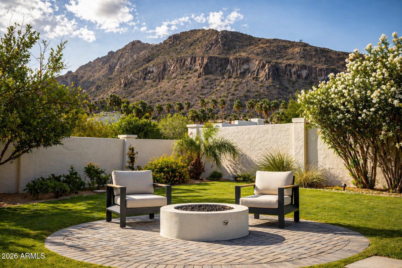 Welcome home to elevated desert living in this architecturally stunning modern Santa Barbara style estate, designed by Joel Contreras in collaboration with Claio Studios. This ground-up completely renovated home, boasts 5 bedrooms and 5.5 baths, including a newly added primary suite. This home blends style and functionality with a private gym, office, and separate entertainment room. Ideally located at the base of Camelback Mountain, just steps from Scottsdale's Old Town, Fashion Square Mall and high-end restaurants, this property is minutes away from everything Scottsdale has to offer. Walls of glass showcase the stunning mountain views, while the backyard features a pool and fire pit; perfect for unforgettable Arizona living.