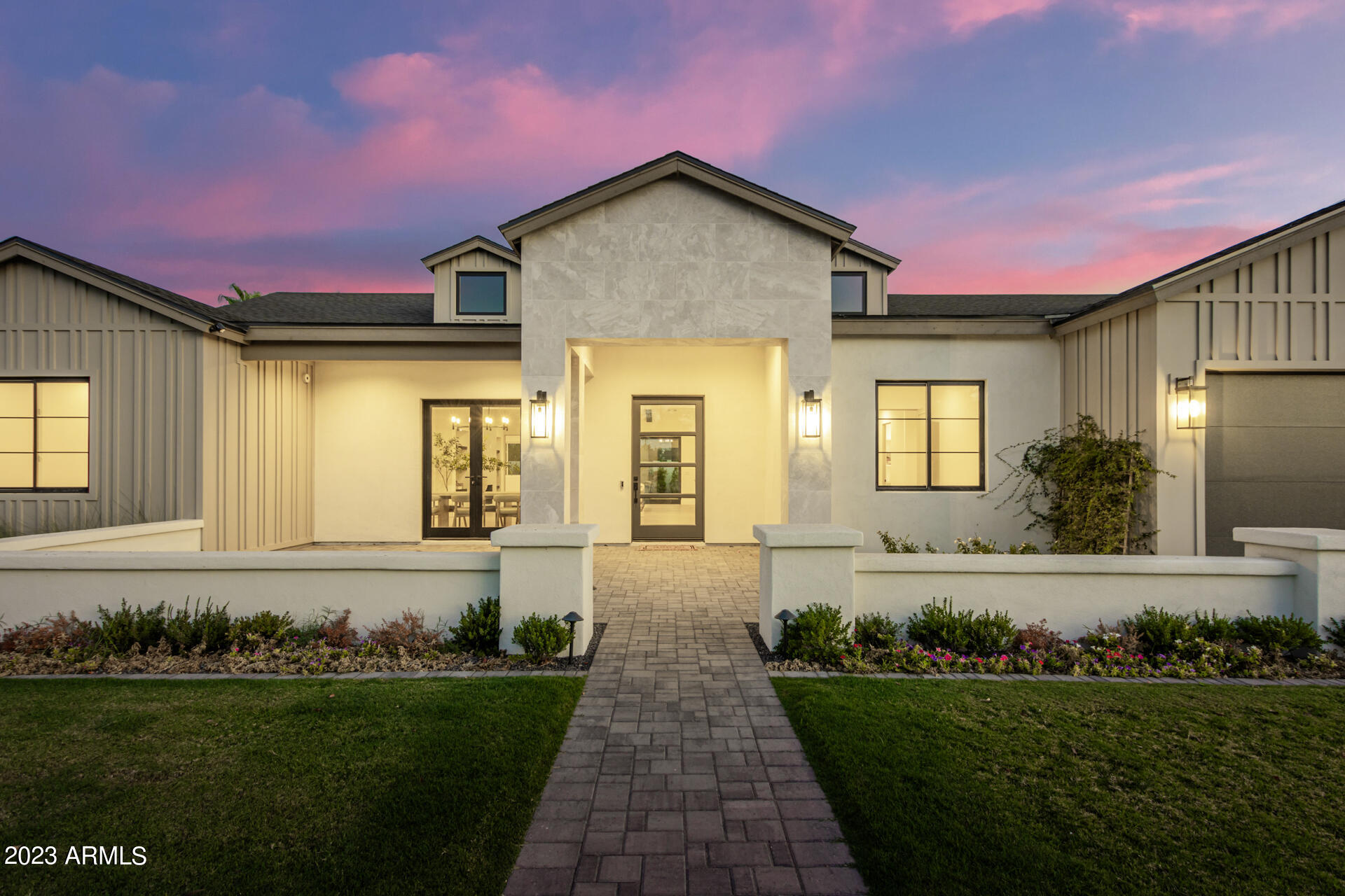 Welcome home to high-quality new construction boasting an array of sleek finishes, a functional open floor plan, pre-wired for smart home features, five ensuite bedrooms, vaulted ceiling in the great room, and 10' ceilings throughout the rest of the home. From the moment you stand in the grand foyer, you will feel right at home. Stepping into the living space, a wall of windows will shower you with natural light and views of your beautifully landscaped backyard with sparkling pool. The highly equipped chef's kitchen is ready for entertaining with high-end appliances, a spacious butler's pantry, under-counter lighting, and a massive 10' island.