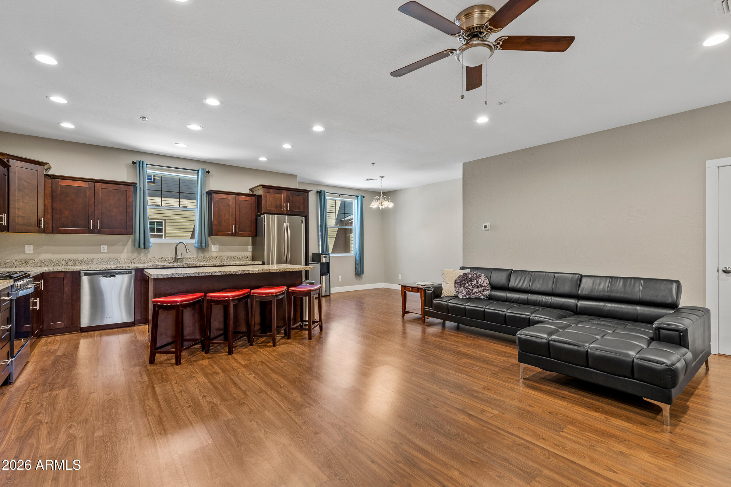 Exceptional townhome in Railroad Springs! Step into this large exquisite multi-level home offering a private second owner's suite on the main level ideal for guests or multi-generational living. 

The second floor showcases the kitchen featuring a massive island with granite countertops that flows seamlessly into an open-concept living area. 

Third floor offers an additional owner's suite plus 2 bedrooms and two full bathrooms. This could be your fantastic full-time home, only for weekend getaways or investment property.

Prime location within a few mins from downtown, NAU and shopping centers.