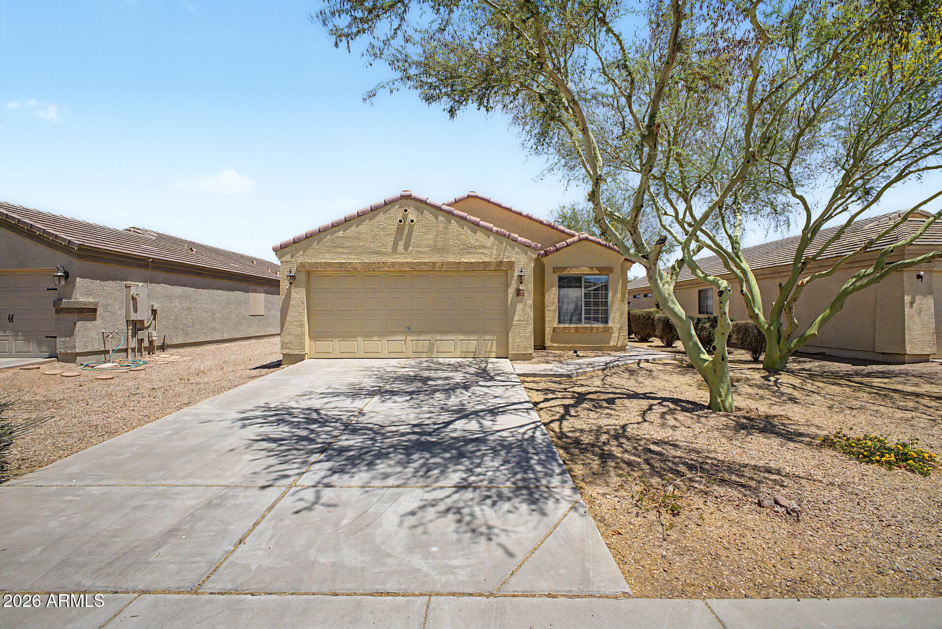 Lowest-priced 4-bedroom single-level home in town!!  Clean and move-in ready home featuring 4 bedrooms, 2 full baths, and a 2-car garage.  Great room floorplan with high vaulted ceilings and a split master bedroom.  Ceiling fans in every room and 2'' blinds on every window.  Looking for more upgrades like new appliances?  The flexible seller is willing add them for you with an increase in the price, so you can make this your dream home.  The Senita neighborhood has a great location, centrally located and only 1/2 mile from Hwy 347 and the Maricopa-Casa Hwy.  
Owner/Agent