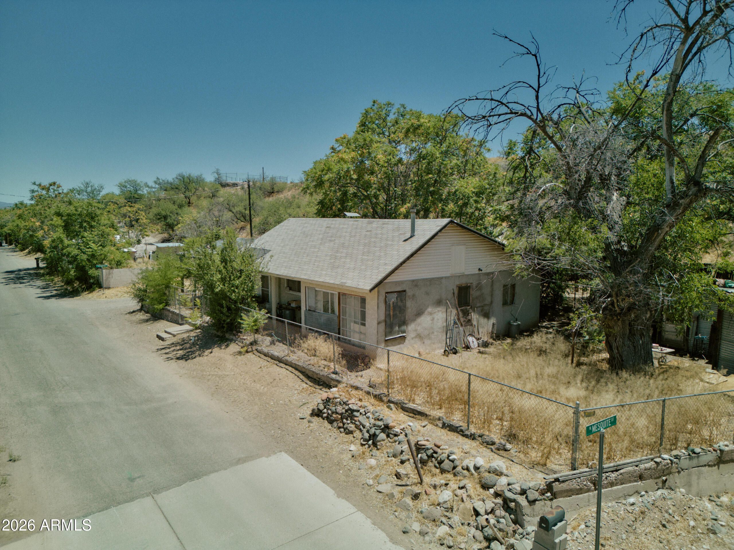 Rare Old Town Cottonwood Package. Two Homes, One Opportunity
A standout opportunity for investors. Two properties offered together in one of the Verde Valley's most walkable and desirable locations, just off Main Street in the heart of Old Town Cottonwood.

The front home at 217 W Pinal St is a 3 bed/1 bath, 1,387 sqft residence on R2-zoned land. The back property at 270 Ironwood St is a 1 bed/1 bath, 719 sqft cottage - together making up a rare dual-property opportunity in one of Cottonwood's most sought-after neighborhoods. Both properties have been vacant for over 20 years and are priced to reflect their condition.

Renovate, fix and flip, or leverage the R2 zoning to explore redevelopment possibilities. Over 2,100 of combined sqft in a prime, walkable Old Town Cottonwood location. Utilities will not be on for inspections.
Each lot is 0.115 acres.
