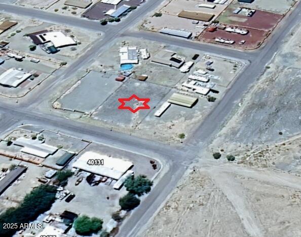 Come take a look at YOUR new property.  IMPROVED LOT! WATER, SEPTIC, POWER TO THE PROPERTY! Located in a quiet neighborhood. .25 acres of all flat and usable land. Power, water and septic are on the property ready for you to build your dream home. No HOA! Make this your weekend getaway, winter retreat or full time resident.  Bring your ATV and ride in the desert for hours. Enjoy hiking in the surrounding mountains Property is very flexible. Manufactured or site built. Fenced on 3 sides (all surrounding neighbors fencing). Don't miss out on this great buy!