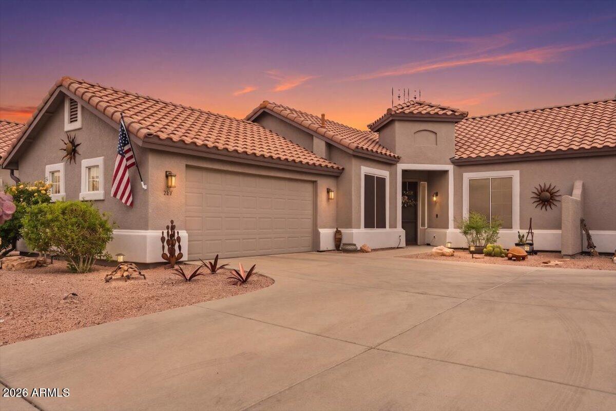 Better than great  2 bedroom 2 bath split floor plan home   located in the gated community of Verde Santa Fe Villas....Community pool just a few steps outside your front door....Within this home you will find it's been well maintained and has numerous remodel/upgrades to include a gas kitchen with SS appliances, composite sink, and quartz counter tops...Plank tile floors throughout the home...Master has a walk in closet, and features a  remodeled bath that includes a walk-in tub/shower with whirlpool feature, and a ''doggie shower''....Backyard which overlooks the golf course features covered patio,  artificial animal friendly turf, planting, trees, and is fully fenced..There is an attached two car garage...