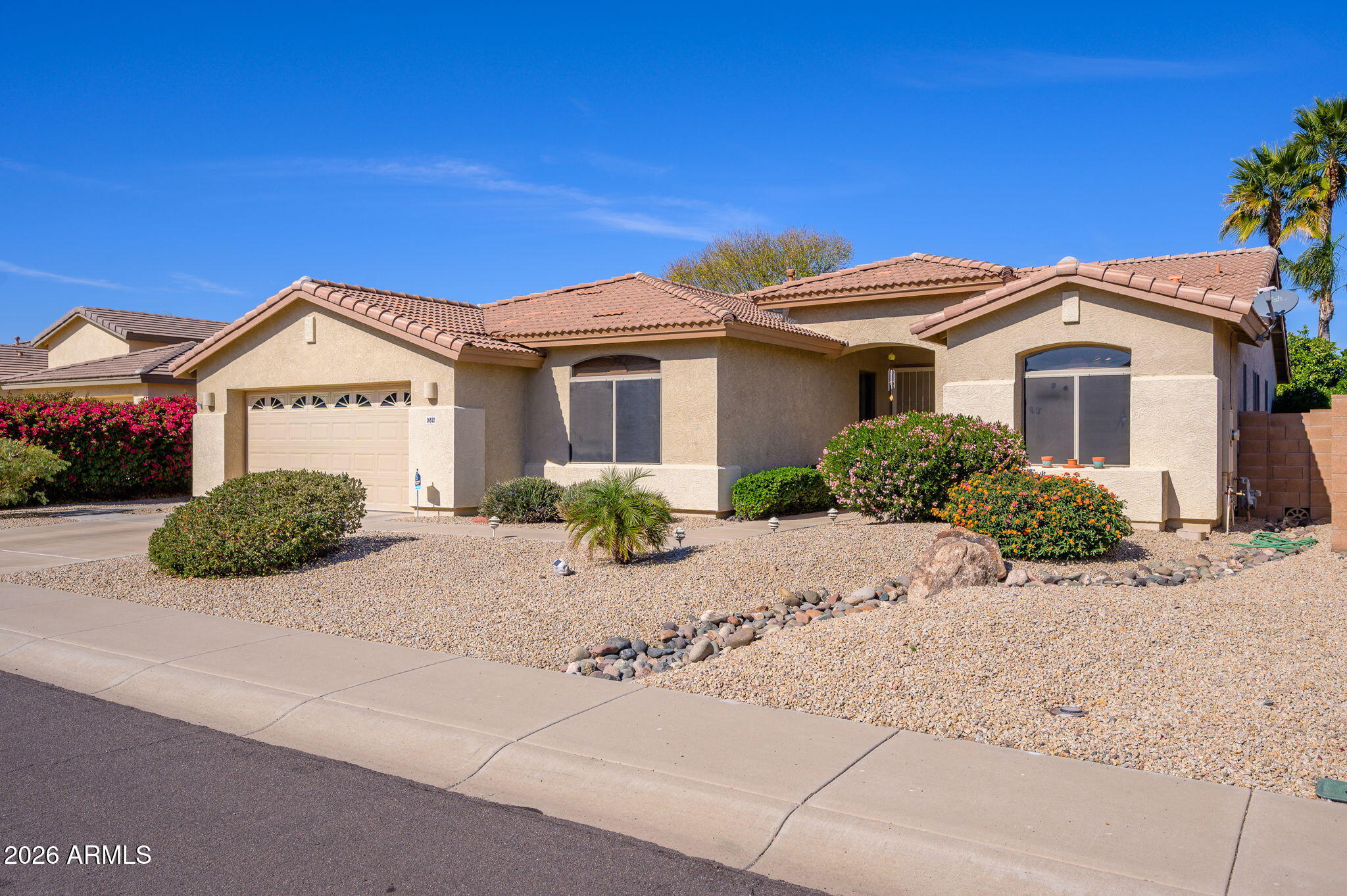 WELCOME HOME to BELL WEST RANCH! This well maintained and cared for home is located on a private cul-de-sac, has 4 bedrooms & a den plus 2 full bathrooms. Kitchen offers UPGRADED HICKORY CABINETS with 42 inch upper cabinets. GAS COOKTOP & separate oven for baking. Primary bedroom is a homeowners retreat with lots of open space with seating next to the bay windows. LARGE WALK-IN CLOSET and plenty of storage. Garage offers an extra 4-foot extension with plenty of storage with built in cabinets. BEAUTIFUL backyard is landscaped with real grass and mature citrus trees to enjoy. Nearby schools and shopping making it convenient and an ideal location. Don't miss out on your chance to OWN this beautiful home. WELCOME HOME!