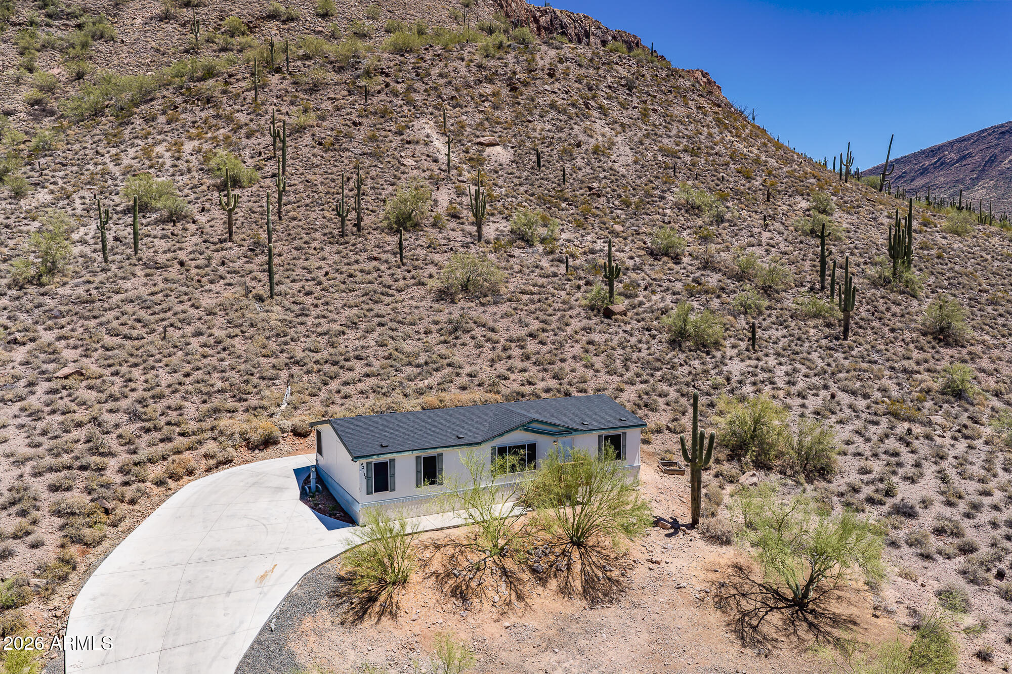 Experience desert living with wide-open space and dark, star-filled skies in New River! Situated on a spacious 1.25-acre lot, this property offers privacy, unobstructed views, and endless potential for horses, toys, RVs, or a workshop. Enjoy Arizona nights where the stars shine bright and the horizon feels endless. Inside features an open-concept layout with abundant natural light, a split floor plan, and comfortable living spaces designed for everyday functionality. No HOA and easy access to I-17, shopping, dining, and hiking. A rare opportunity to own acreage with space, freedom, and true desert serenity.