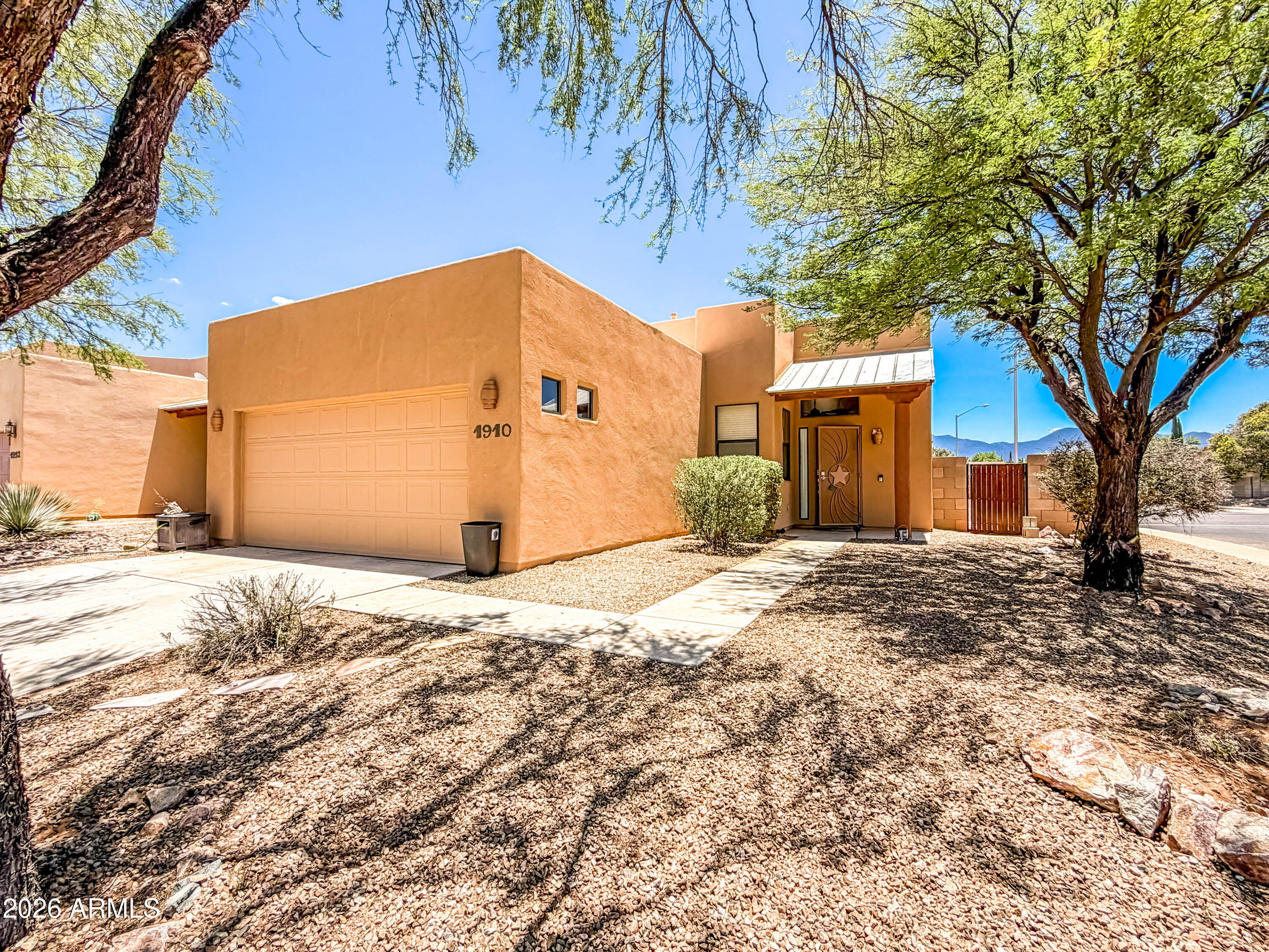 Welcome home to this beautifully updated 1,539 sq. ft. residence located in one of Sierra Vista's most desirable neighborhoods! Featuring 3 bedrooms and 2 bathrooms, this move-in-ready home offers an open-concept floor plan with soaring ceilings, abundant natural light, and attractive tile flooring throughout the main living areas. Home features a newer HVAC system and a newer water heater, providing comfort and peace of mind for years to come. The spacious kitchen and living areas flow seamlessly together, making this home perfect for both everyday living and entertaining. The oversized deep 2-car garage provides ample room for vehicles, storage, or hobbies. This home combines convenience with an exceptional location. Step outside to enjoy a low-maintenance backyard and stunning mountain views--perfect for relaxing and enjoying Arizona's beautiful sunsets. Don't miss this opportunity--schedule your private showing today!