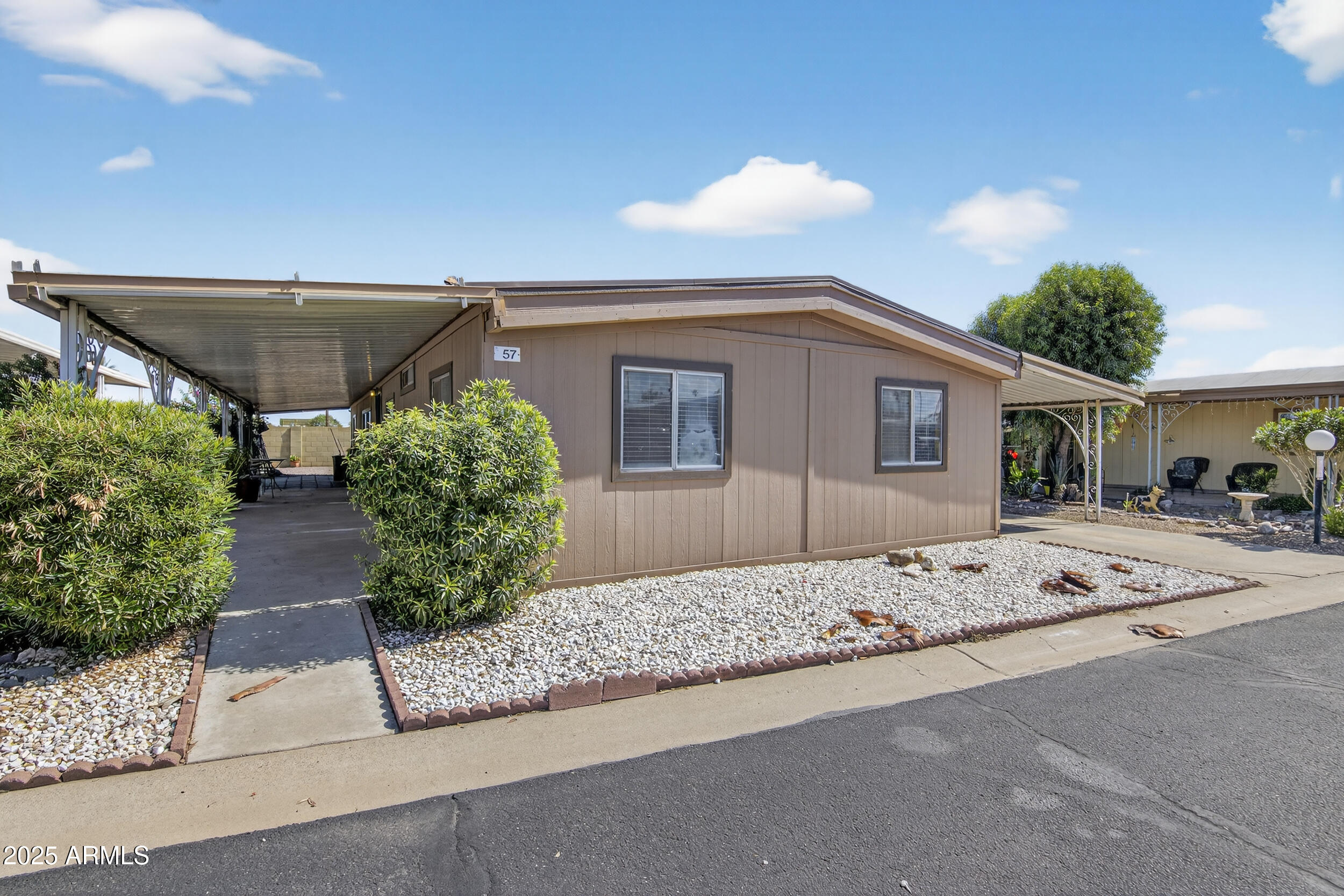 Welcome to this spacious 3-bedroom, 2-bath manufactured home located in a well-maintained community! Step inside to find an inviting open floor plan featuring beautiful exposed beams in the main living area and generously sized rooms throughout. The home offers both comfort and functionality, perfect for everyday living or entertaining guests.
Enjoy the convenience of a prime location within a desirable mobile home park that offers resort-style amenities — including a heated pool and spa, recreation hall with a full kitchen for hosting events, fitness room, dog park, laundry facilities, guest bathrooms and showers, BBQ and grill areas, Wi-Fi in the clubhouse, and a playground. This home combines comfort, community, and convenience