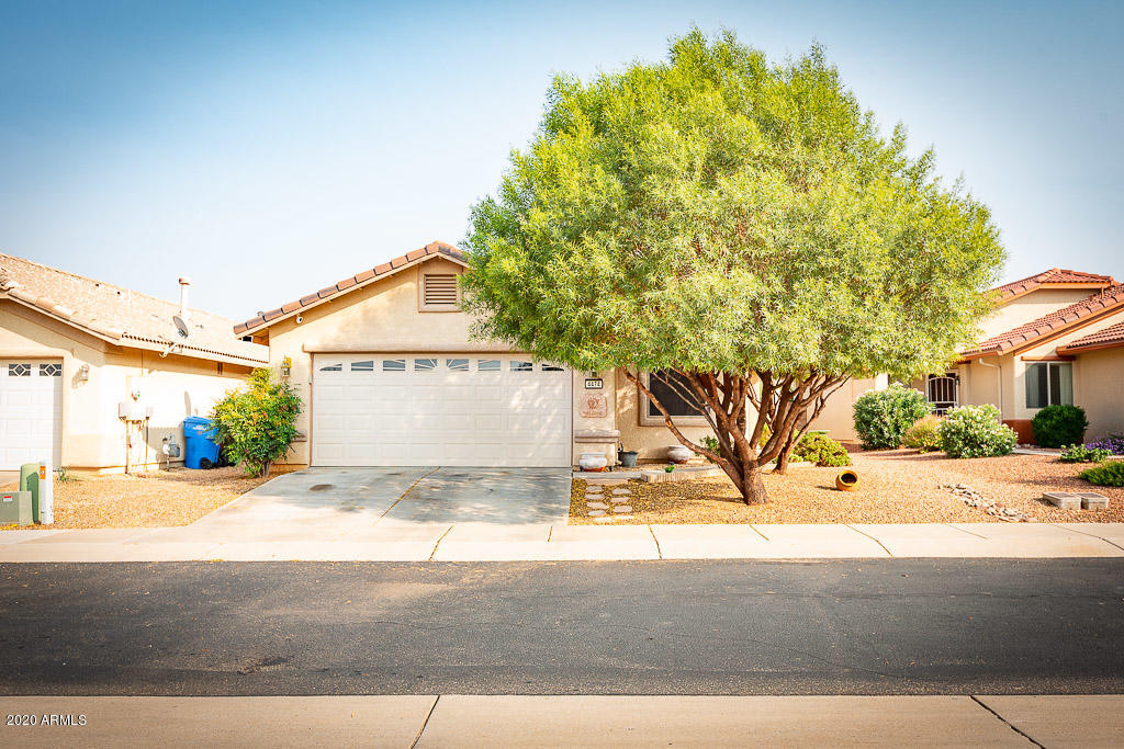 It is TIME TO MOVE to this beautiful home in the highly desired subdivision of HOLIDAY. This home has 3 bedrooms and 2 bathrooms. Main living area has wood like tile. LIKE THE ARIZONA outdoor living?? This is perfect with the grass area, gazebo and backing up to nature walk area... SO NO BACKYARD neighbors! Call today to schedule your private showing.