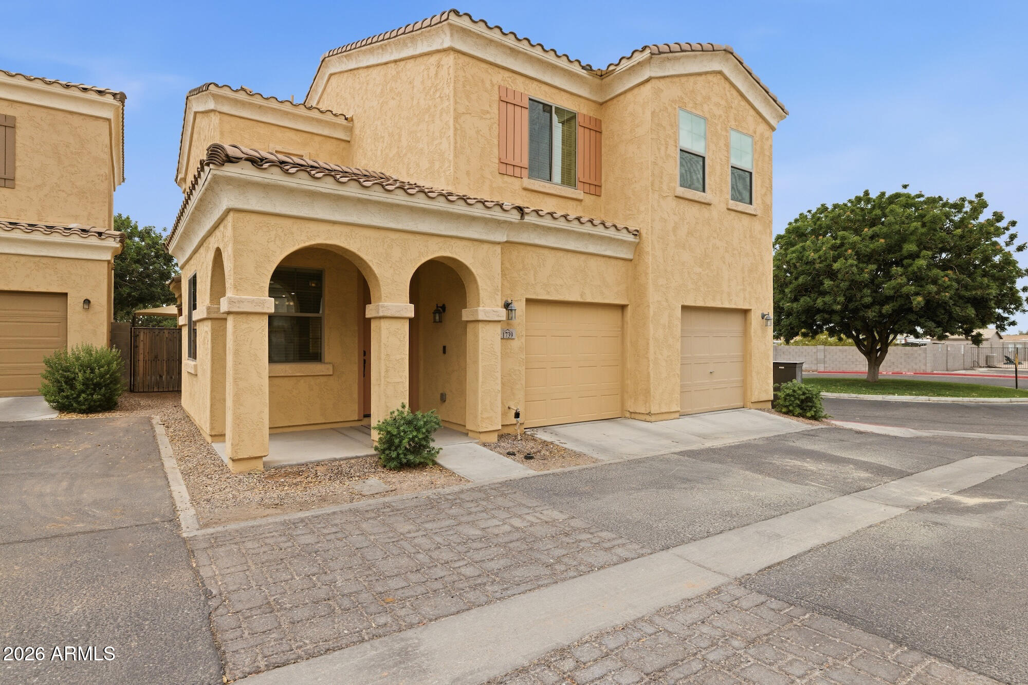 This 1,892 sq ft single-family home offers 3 bedrooms, 3 bathrooms, and a functional layout with plenty of space. Recent updates include new interior paint, new carpet, and new rock in the backyard. The main level features tile flooring, an open living area, and a kitchen with white cabinets, stainless steel appliances, a large island, and good counter space. The backyard is low maintenance with a covered patio, making it easy to enjoy the outdoors. Located in a community with a pool and park, this home offers everyday convenience and useful amenities.