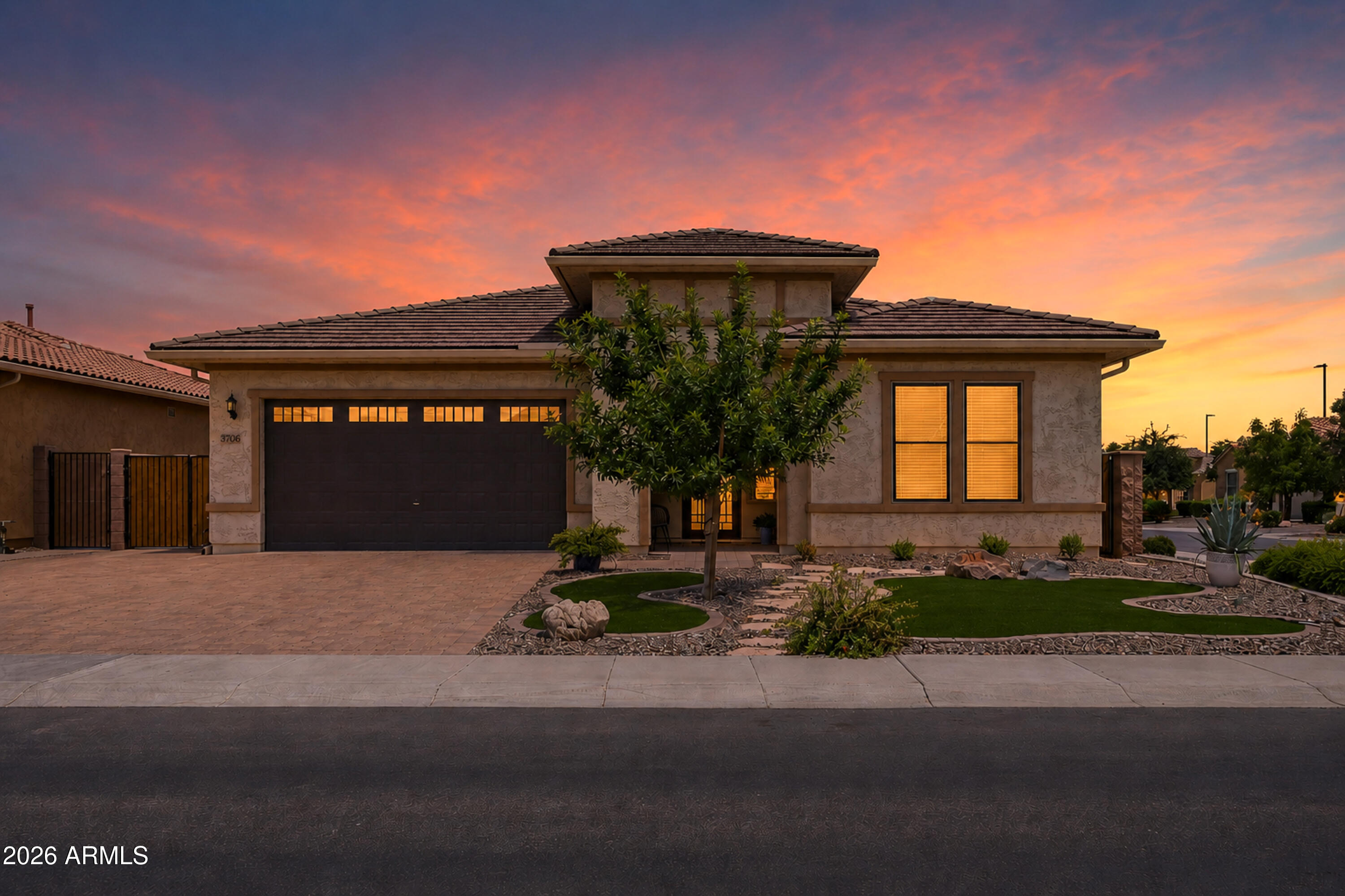 Located in the highly sought-after Bridges at Gilbert community, this beautifully maintained single-story home offers the perfect combination of style, functionality and location. Featuring 4 bedrooms, 3 bathrooms, and a spacious 3-car tandem garage, this move-in-ready property sits on a private corner lot with an RV gate and extended driveway for added convenience and flexibility.

Inside, you'll find tile flooring throughout the entire home, plantation shutters, and a bright open-concept layout designed for comfortable everyday living and effortless entertaining. The kitchen is a true centerpiece, showcasing a large island, stunning white granite countertops, designer backsplash, rich brown cabinetry with convenient pull-out drawers, and plenty of prep and storage space. The spacious.. primary suite offers a relaxing retreat with dual vanities, a luxurious super shower, and a large walk-in closet. Additional highlights include a spacious laundry room with washer and dryer included, a security system, full gutters around the home, and thoughtful upgrades throughout. Step outside to enjoy an exceptionally low-maintenance backyard complete with turf, an extended paver patio, stepping stones, a gas stub for outdoor cooking and a storage shed. The private corner lot creates the perfect setting for relaxing or entertaining year-round.Living in the Bridges means access to incredible community amenities including parks, walking paths, playgrounds, lakes, splash pads, basketball courts, and the award-winning Bridges Elementary. The location is unbeatable - just moments from Gilbert Regional Park, shopping, dining, top-rated schools, freeway access, and everything Gilbert has to offer. This home has been meticulously cared for and is truly turnkey from the moment you arrive.