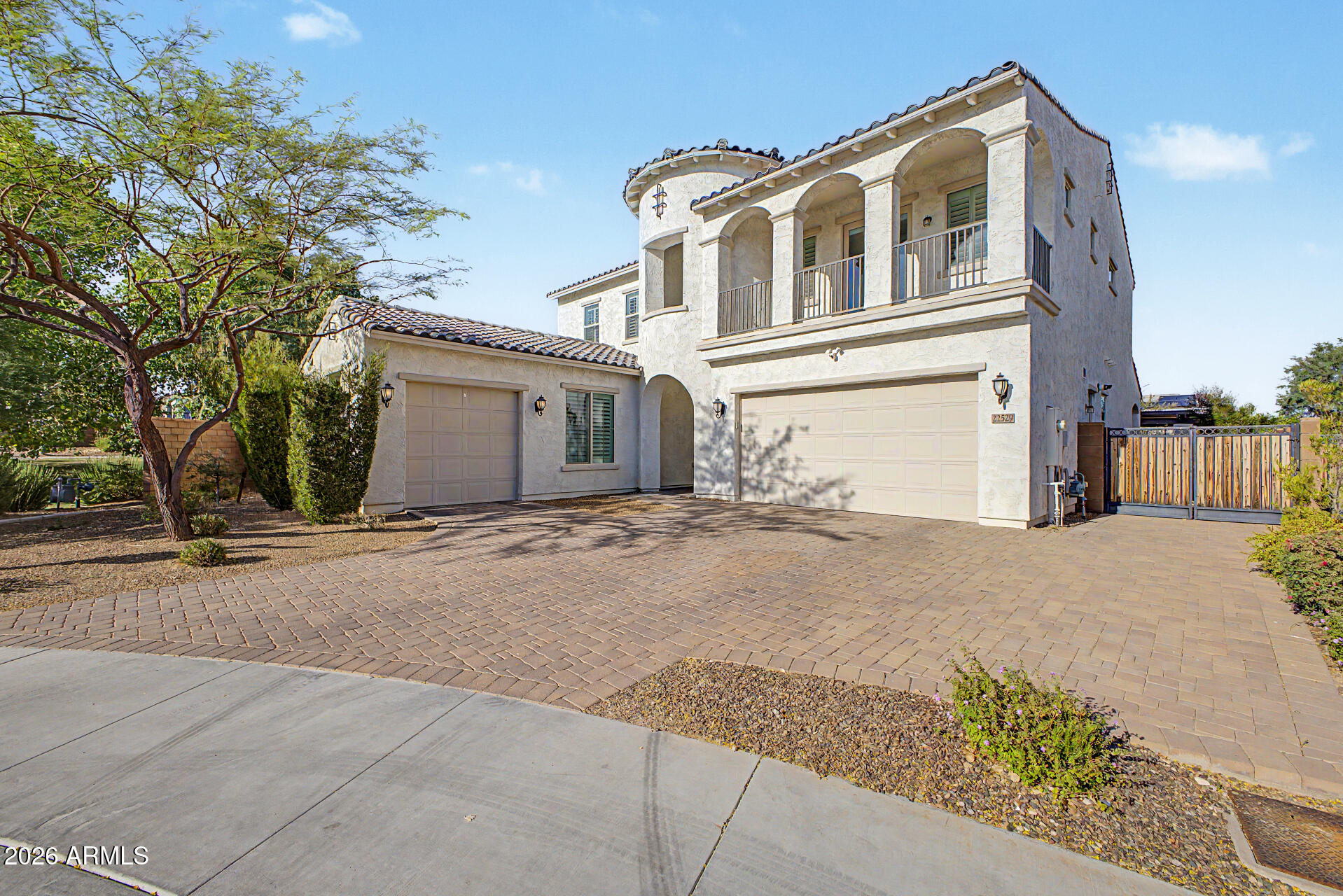 Welcome to this stunning two-story home offering 5 bedrooms, 4.5 bathrooms, and an ideal layout designed for both everyday living and entertaining. Situated on a desirable corner lot, this home features a spacious 3-car garage and incredible indoor-outdoor living spaces.

Step inside to discover a thoughtfully designed floor plan with a full bedroom and bathroom downstairs, perfect for guests or multigenerational living, along with a dedicated playroom/flex space. Upstairs you'll find a generous loft area that creates the perfect second living space, game room, or media area, accompanied by three guest bedrooms and two additional bathrooms. The spacious primary suite serves as a private retreat, featuring dual vanities, a luxurious super shower, and an exclusive private balcony where you can enjoy your morning coffee or unwind at the end of the day.

The backyard is built for entertaining and low-maintenance enjoyment, complete with artificial turf and a pergola-covered seating area, creating the perfect space for gatherings, play, or relaxing outdoors.

With abundant space, flexible living areas, and desirable features throughout, this home offers comfort, style, and functionality all in one exceptional package.