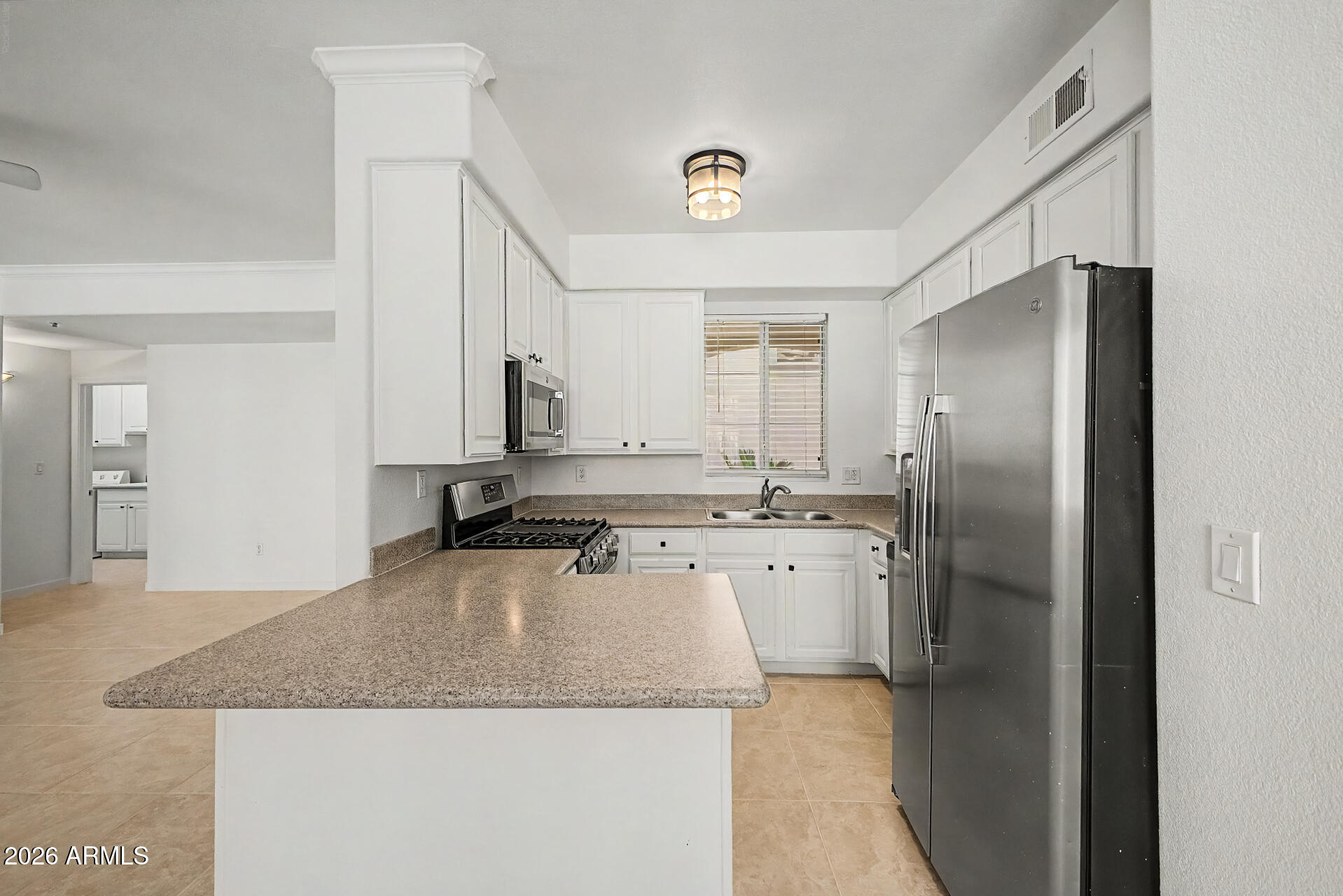 Step into luxury at Villas at Bellagio! A niche and gated community in the heart of Old Town Scottsdale! Recently renovated GROUND FLOOR unit with THREE bedrooms & two FULL bathrooms! Unit sits in the middle of the community, adjacent to the pool. Through the sliding glass door - you can see the sparkling pool. Recent renovations include: full interior paint, new baseboards, new plumbing fixtures, new glass shower door, new interior and exterior door hardware, new lighting and much more! This community features a community pool, BBQ areas and is fully gated! The building this unit is in just had all roofs redone! HVAC replaced in 2019, Appliances replaced in 2023, Roof replaced in 2026. HOA includes water/sewer/trash and roofing! Don't miss this one, come see it today!
