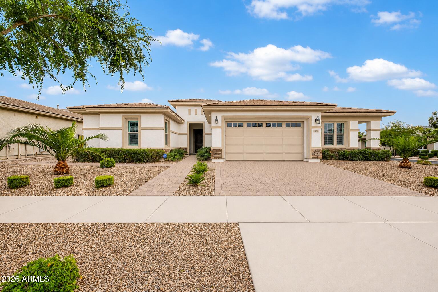 Stunning single-story home offering 5 beds, 4 baths, and a versatile bonus room. Fresh paint, tile flooring, plantation shutters, ceiling fans, & an abundance of storage thru-out. Impeccably maintained and shows like new. Open great room floor plan features a stunning retractable glass wall, seamlessly blending indoor and outdoor living. Resort-style backyard with pool, built-in BBQ, ramada, & artificial turf. Chef's kitchen boasts shaker cabinets, waterfall island, quartz countertops, designer backsplash, SS Monogram appliances, and a spacious walk-in pantry. Luxurious owner's retreat includes a spa-like en-suite with dual sinks, sep tub & shower, large walk-in closet, and private backyard access. N/S exp, 3CG, EV-ready w/1 charging station installed and a 2nd 220V line pre-run and capped saving thousands in future installation costs. Water Softener also included. Fabulous communities amenities include...pool, clubhouse complete with kitchen, BBQ, work-out facility, & playgrounds. Conveniently located with easy access to the 24 & 202 fwys, plus dining, shopping, and entertainment nearby.