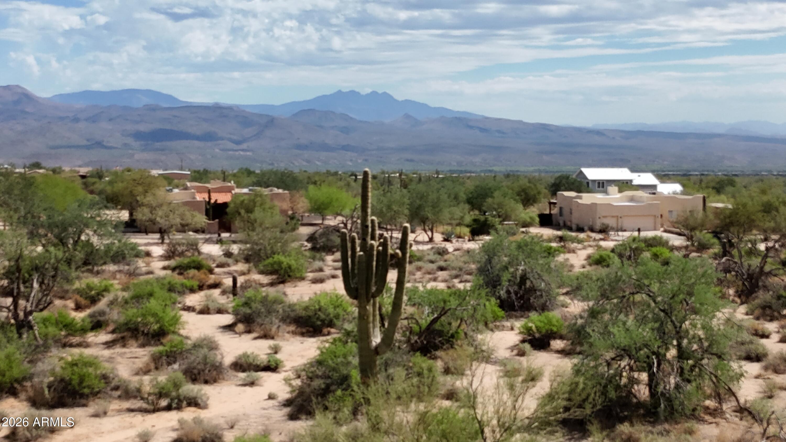 Prime buildable lot in coveted Northeast Scottsdale offering breathtaking views of Four Peaks and the McDowell Mountains. Enjoy immediate access to the Tonto National Forest, putting hiking, biking, and outdoor adventure right at your doorstep. The property features a beautiful, mature desert landscape with iconic towering saguaro cacti, creating an authentic Sonoran Desert setting. Adjacent parcel (219-41-003N) is also available, 1.1 acres offered at $119,000, providing an excellent opportunity to expand your footprint or invest in additional land.