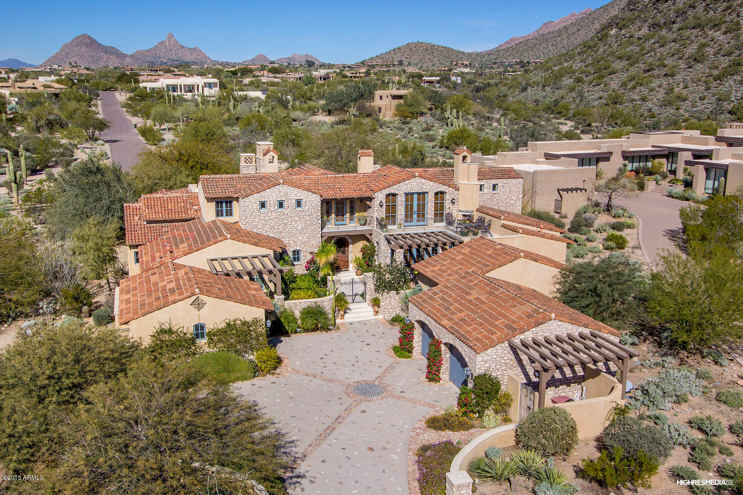 Price reduction by motivated sellers. . Amazing Mediterranean Chateau of superior construction as only Tom Archer can deliver. Stone and wood from floor to ceiling make this a home for the ages. Mullioned windows and french doors bathe the interior Venetian plastered walls in natural light. Limestone fireplace surrounds. Huge great room with disappearing glass wall is anchored to the professionally appointed kitchen by the entertaining bar. Sub-Zero, Wolfe, Asko. Impressive 1st flr master suite. BR's are en suite. Ultimate outdoor entertaining.  Relax in the garden bower with tranquil  pool & spa & spilling water features. Protected views to Pinnacle Peak. Upstairs study provides a quiet work retreat. Furniture available for purchase. Tour the DC Country Club while you are here Community Amenities at DC Ranch
The privateGolf & Country Club at DC ranch