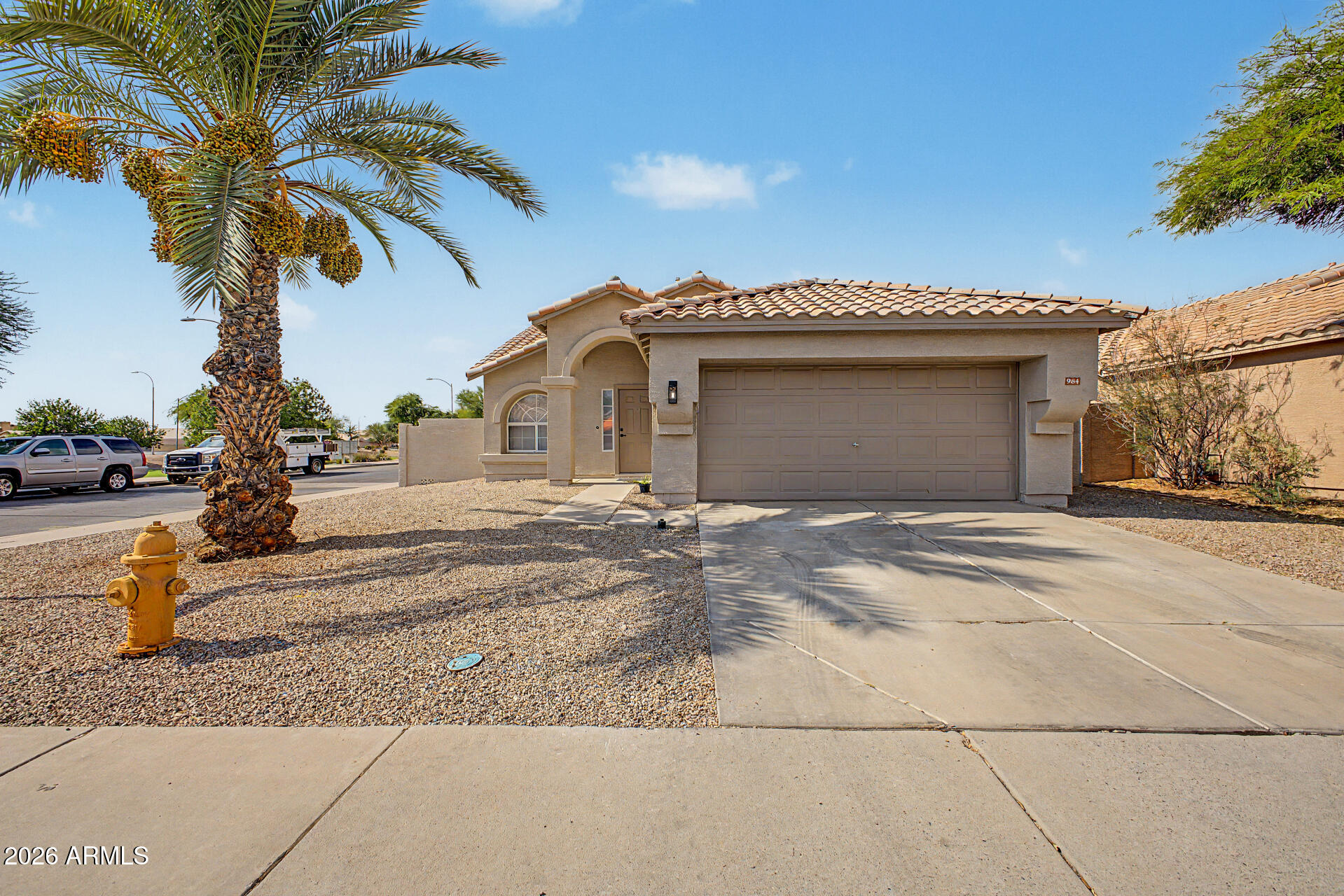 Excellent Chandler location on a desirable corner lot with a heated pool, perfect for year-round enjoyment. Conveniently located just minutes from Loop 202, providing easy access without freeway noise. Enjoy being close to vibrant Downtown Chandler with its popular restaurants, shopping, festivals, and year-round community events. Located near the historic San Marcos Golf Course and within the highly regarded Hamilton High School attendance area, with Chandler High School also nearby. A New Costco Business Center with a Gas station is opening nearby, adding even more convenience. This home offers the ideal combination of location, lifestyle, and accessibility, highly producing Lime Tree in the back, with soft water and RO systems.