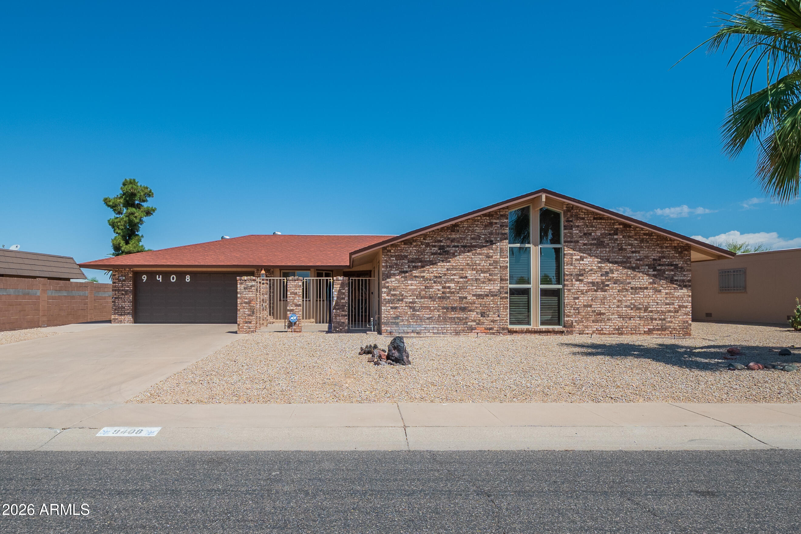 Welcome to this beautifully maintained 2-bedroom, 2-bath home with a versatile den, offering 2,225 sq. ft. of living in the sought-after active adult community of Sun City. This home features a bright and open layout with both formal living and dining rooms-perfect for entertaining. The primary suite boasts vaulted ceilings and a remodeled en-suite bath, creating a relaxing retreat. The guest bathroom has been updated with a new vanity and light.Numerous upgrades including brand-new windows and plantation shutters, adding both style and energy efficiency. A spacious laundry room provides added convenience. Hobby enthusiasts will love the rare 2-car garage plus a separate golf cart garage with dedicated door and parking space. There's an additional 17x11 hobby or storage room.