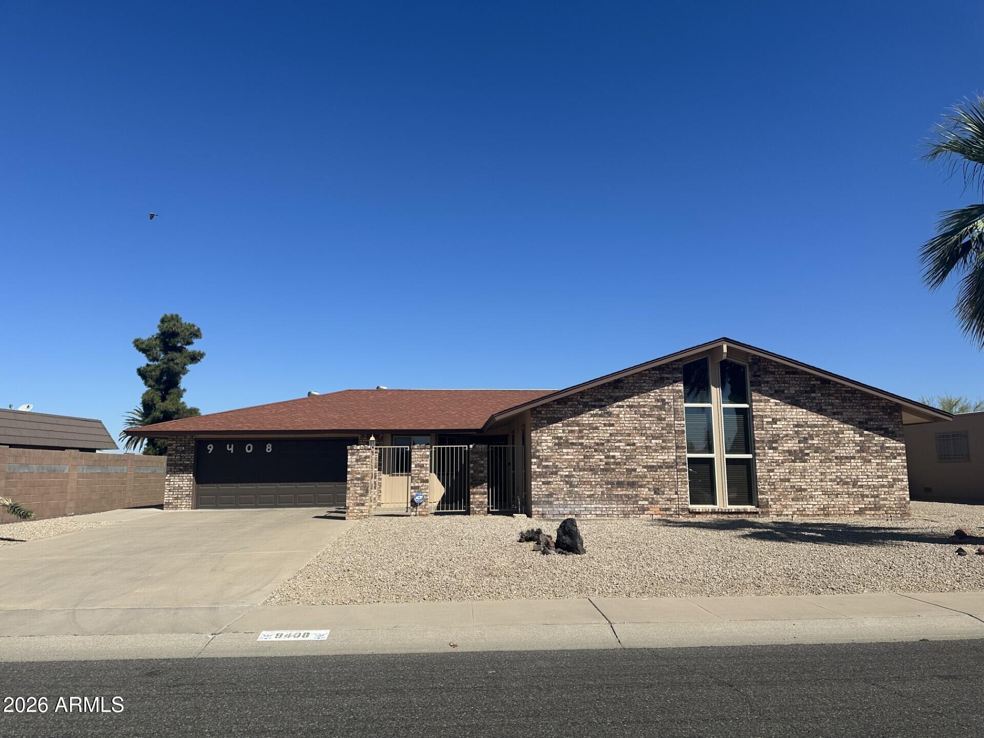 Welcome to this beautifully maintained 2-bedroom, 2-bath home with a versatile den, offering 2,225 sq. ft. of living in the sought-after active adult community of Sun City. This home features a bright and open layout with both formal living and dining rooms-perfect for entertaining. The primary suite boasts vaulted ceilings and a remodeled en-suite bath, creating a relaxing retreat. The guest bathroom has been updated with a new vanity and light.Numerous upgrades including brand-new windows and plantation shutters, adding both style and energy efficiency. A spacious laundry room provides added convenience. Hobby enthusiasts will love the rare 2-car garage plus a separate golf cart garage with dedicated door and parking space. There's an additional 17x11 hobby or storage room.