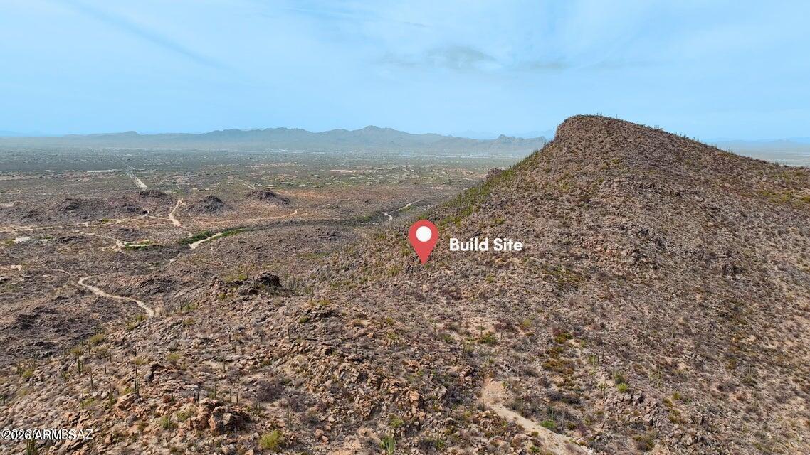 Commanding one of the most striking positions within Saguaro Ranch, Lot 55 showcases the raw beauty and magnitude of the Tortolita Mountains on a grand scale. Elevated and expansive, this estate homesite is surrounded by endless desert, dramatic terrain, and panoramic views that stretch for miles.
The sense of space, privacy, and natural power here is unmatched--offering a setting that feels both secluded and extraordinary. Positioned between Dove Mountain and Stone Canyon and accessed through the iconic tunnel entrance, this is a rare opportunity to create a truly one-of-one luxury estate in one of Tucson's most captivating landscapes.