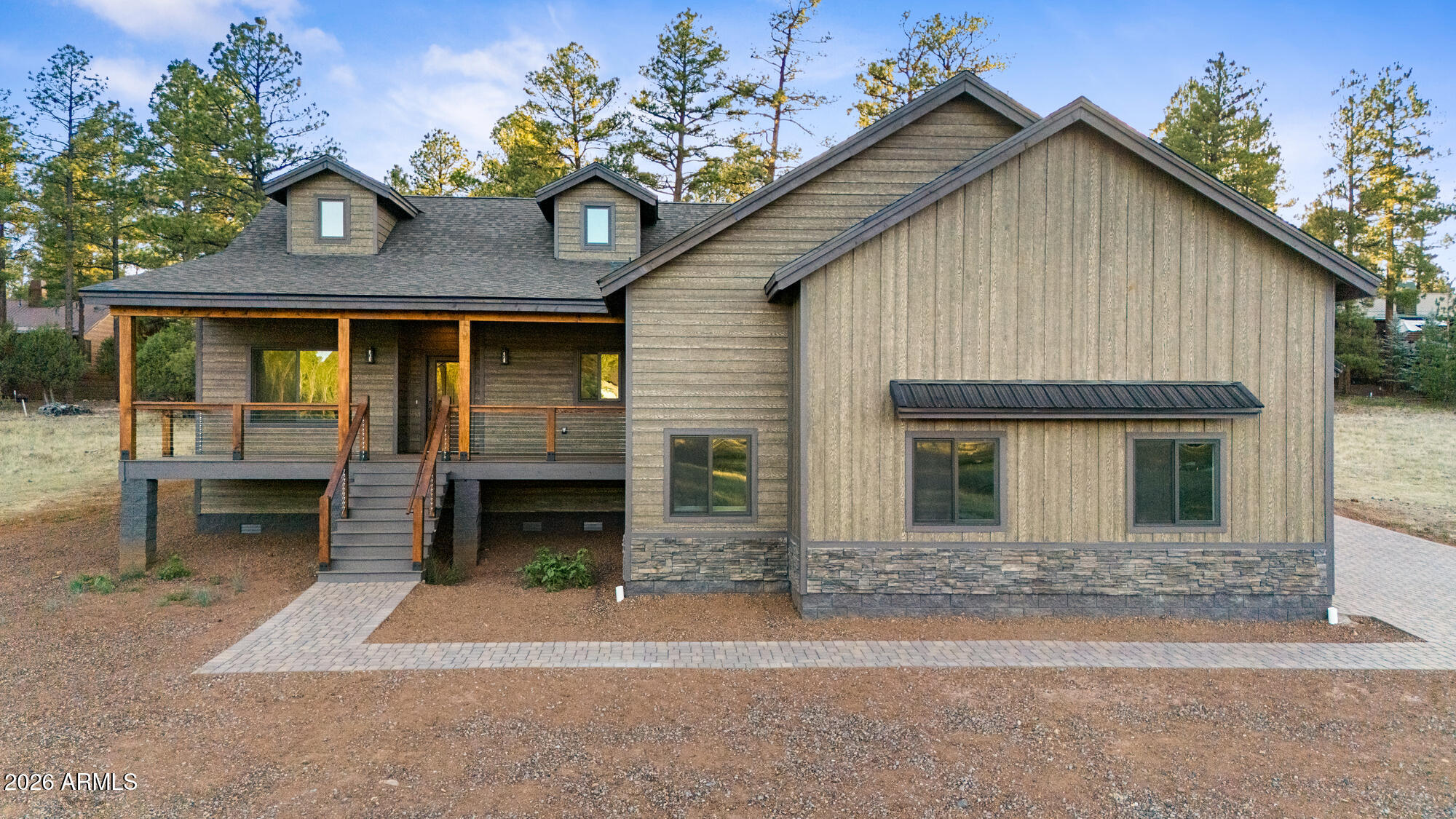 Imagine living in a brand new home in the prestigious Torreon Community. Be the first to live in this perfectly appointed mountain home with all of the upgrades and touches you would expect in a custom home. Outside, you have spacious front and back decks. The covered front porch allows you to sit and watch the wildlife gather around the community water feature across the street. When you hang out on the rear deck, you can enjoy the beautiful tall pine trees at the back of the lot. Inside, you can relax or entertain and take advantage of the open, great room floor plan with fireplace. The beautifully designed kitchen with island, stainless steel appliances and lots of storage space is sure to impress. The split floor plan boasts a primary bedroom with on-suite bathroom featuring a jacuzzi tub and separate walk-in shower with custom tile work on one side of the house. On the opposite side of the great room, you'll find a front den/sitting area with a picture window to enjoy the wildlife, a built-in desk and cabinets in the hall, plus 3 more bedrooms and a full bathroom. Please see the attached document with a list of many of the home's upgraded features, from a tankless gas water heater to a paver driveway. And don't forget, all this in the Torreon Community with a clubhouse, restaurant, pool/hot tub, fitness center, playground, pickleball courts, 2 18-hole championship golf courses, 24/7 security and so much more. Come check out both the home and the community. I'm sure you'll want to make this your new home and get settled in soon to enjoy everyone's favorite summer season in the White Mountains. Owner is a licensed Realtor in Arizona.