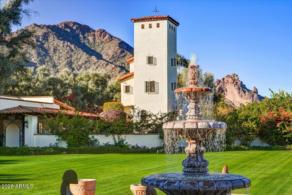 The Crown Jewel of Paradise Valley - In Arizona's most prestigious enclave sits this exquisite 9.14-acre multi-residence gated compound, offering a level of scale and sophistication that is truly without peer. As the largest non-hillside, fully landscaped flat estate currently available in Paradise Valley, this legacy property represents a once-in-a-generation opportunity for the discerning buyer.
Spanning over nine contiguous acres of lush, masterfully designed grounds, the estate offers an unparalleled sense of privacy and serenity. Unlike hillside properties, the entirely flat terrain provides seamless, usable acreage for grand-scale entertaining, private luxurious amenities , or expanded residential quarters.