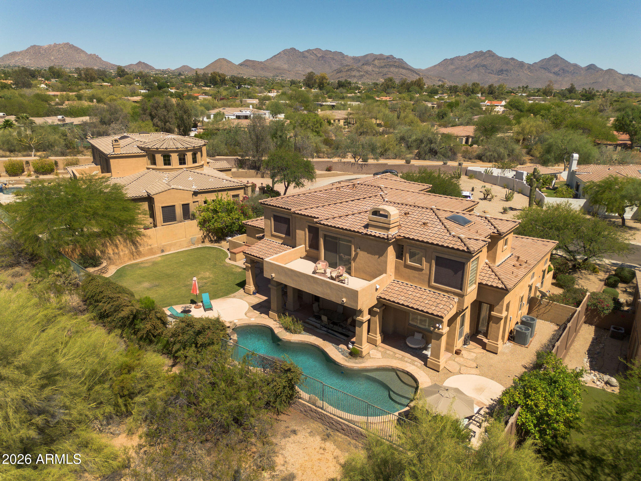 Discover exceptional desert living in Sonoran Hills. Tucked at the end of a quiet cul-de-sac, this beautifully updated home offers space, privacy, and breathtaking mountain views and sunsets. Near Pinnacle Peak Prep and a newly renovated park with sports courts, playgrounds, and dog-friendly amenities. The 4,035 sq. ft. split floor plan features 5 bedrooms, 4.5 bathrooms, and walk-in closets in every bedroom. Highlights include a brand new roof, gated courtyard, 3-car garage, modern flooring, plantation shutters, upgraded kitchen, formal living room with fireplace, and den. The backyard is made for Arizona living: pool, built-in BBQ, and covered patio. The new roof comes with a transferable 30-year warranty. Reasonably motivated seller and well-appointed home, don't miss it!