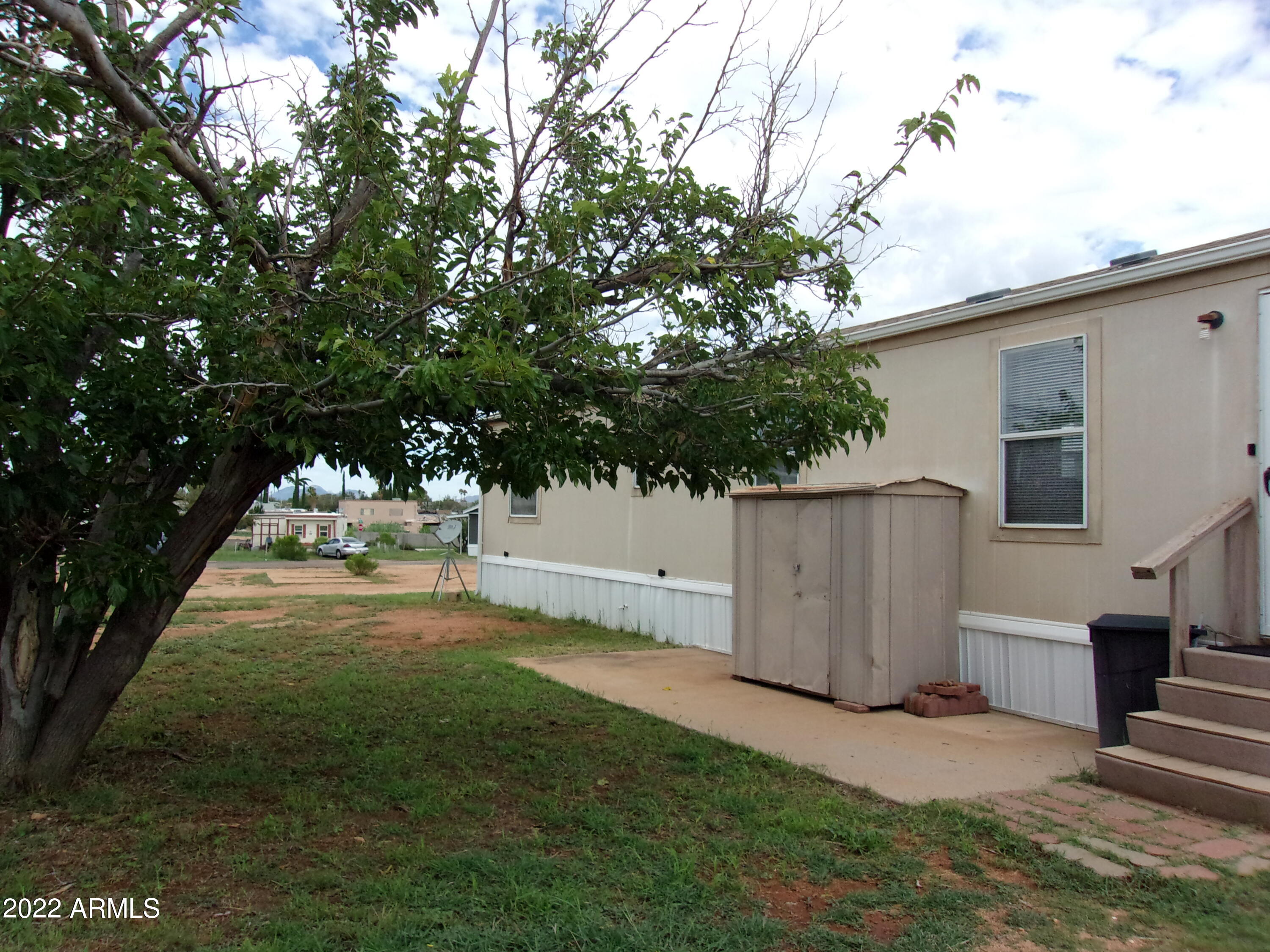 Three bedroom two bath 2008 trailer.  Carpet through out  home.  Well maintained one owner.  New roof, and new plumbing and floor in hall bathroom.  Located close  to shopping.  Move in ready.