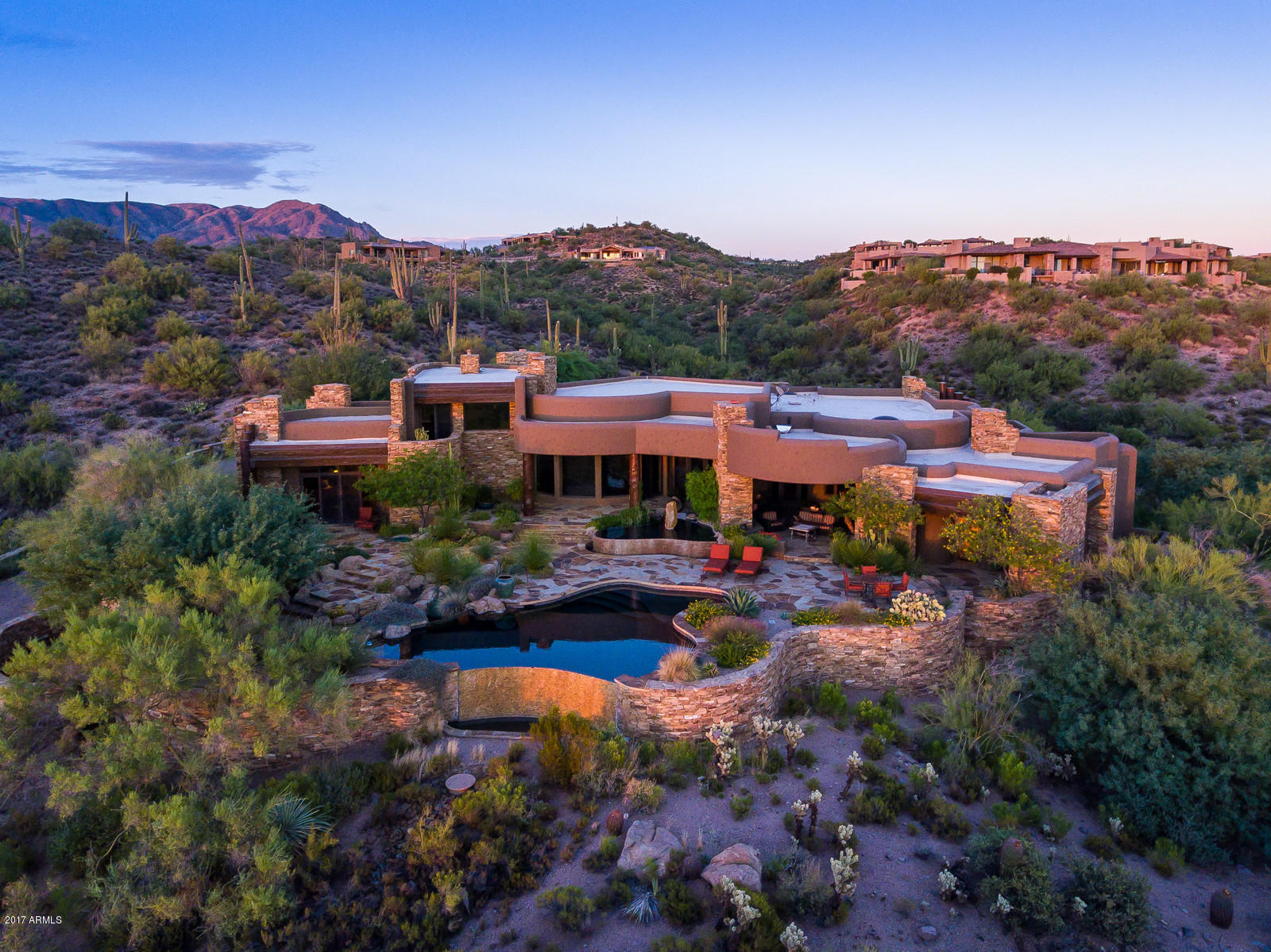 The best of the best, great views, great location, great finishes, great functionality!  This home sits on on nearly 2.5 acres and offers terrific views of the Valley of the Sun, city lights, two golf holes (17 & 18 of Renegade), gorgeous sunsets and open space.  This is a rare opportunity in Desert Mountain to get “all of the views” but be just minutes from the font gate.  Nestled in the Preserve section of Gamble Quail, the open and flowing floor plan with three en-suites, study (with views that are forever), plus a Casita with living room and bedroom (Casita has direct access to patio/pool/spa).  Spectacular outdoor living offers an “outdoor'' living room complete with tv, in ceiling heaters, fire place and outdoor dining. The generous size patio is complete with a resort like pool and spa.  Inside no expense has been spared in the finish level of this desert retreat.  From the gourmet kitchen to the detail in the ceilings, this is as fine of finishes you will find in any high end home in North Scottsdale.  Truly one of a kind!
