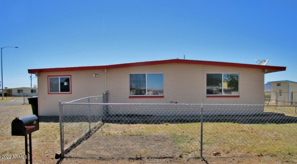 This 3BR/2BA, 1260 sq.ft. home is located in Huachuca City, AZ minutes from Ft. Huachuca, AZ. The open floor plan includes a large living room and has been freshly painted. The large yards have room for the pets and plenty of parking. Call today.