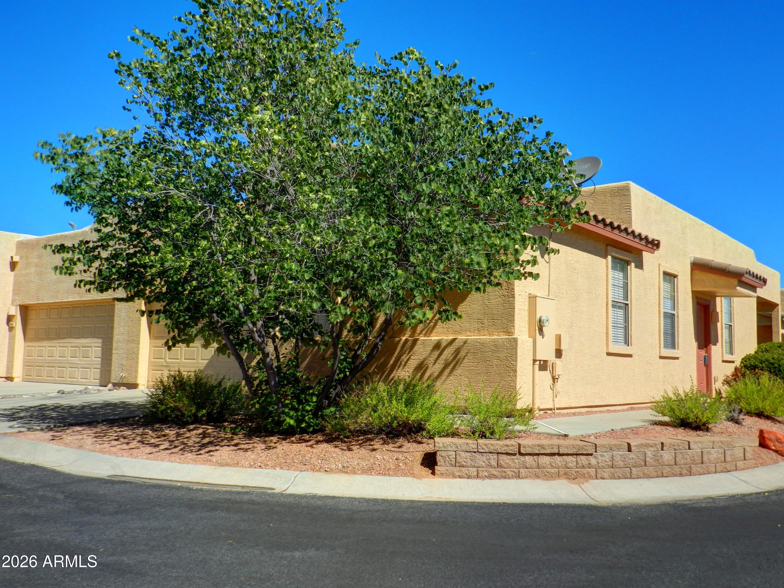Adorable one level townhouse in the desirable Cottonwood Square/Cottonwood Commons development.  2 large bedrooms with on suite full bathrooms.  Located on a private corner lot with attached 2 car garage.   Open floor plan with spacious kitchen and large living room with access to a private patio.  This lovely unit is in excellent condition!