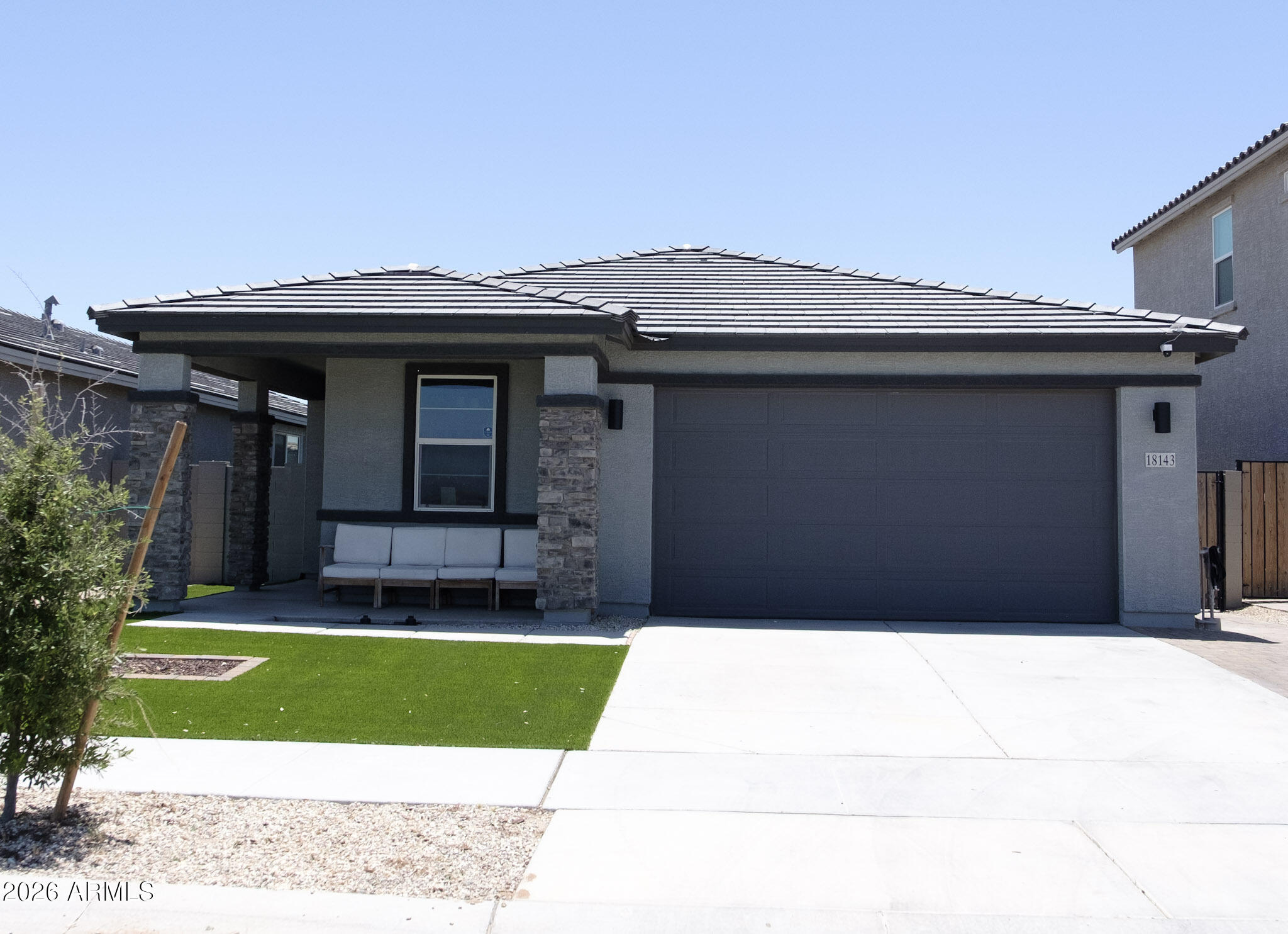 Bright and Open single level home. Get a newer home with upgrades and a finished backyard with Turf front & back! This home has an inviting entry with beautiful ledgestone. Open layout kitchen with stone gray cabinets, backsplash, large Granite Island with breakfast bar, and walk in pantry. Open kitchen, dining and great room with lots of natural light. Two-tone paint, tile and LVP flooring throughout all bedrooms, No CARPET! Two sinks in hall bath, 9' ceilings, upgraded Brushed Nickel fixtures, 8' garage door. Expansive walk-in closet in primary bedroom, has tons of storage. Extended paver driveway for 3 car parking. Don't Miss this AMAZING Move-In Ready home!