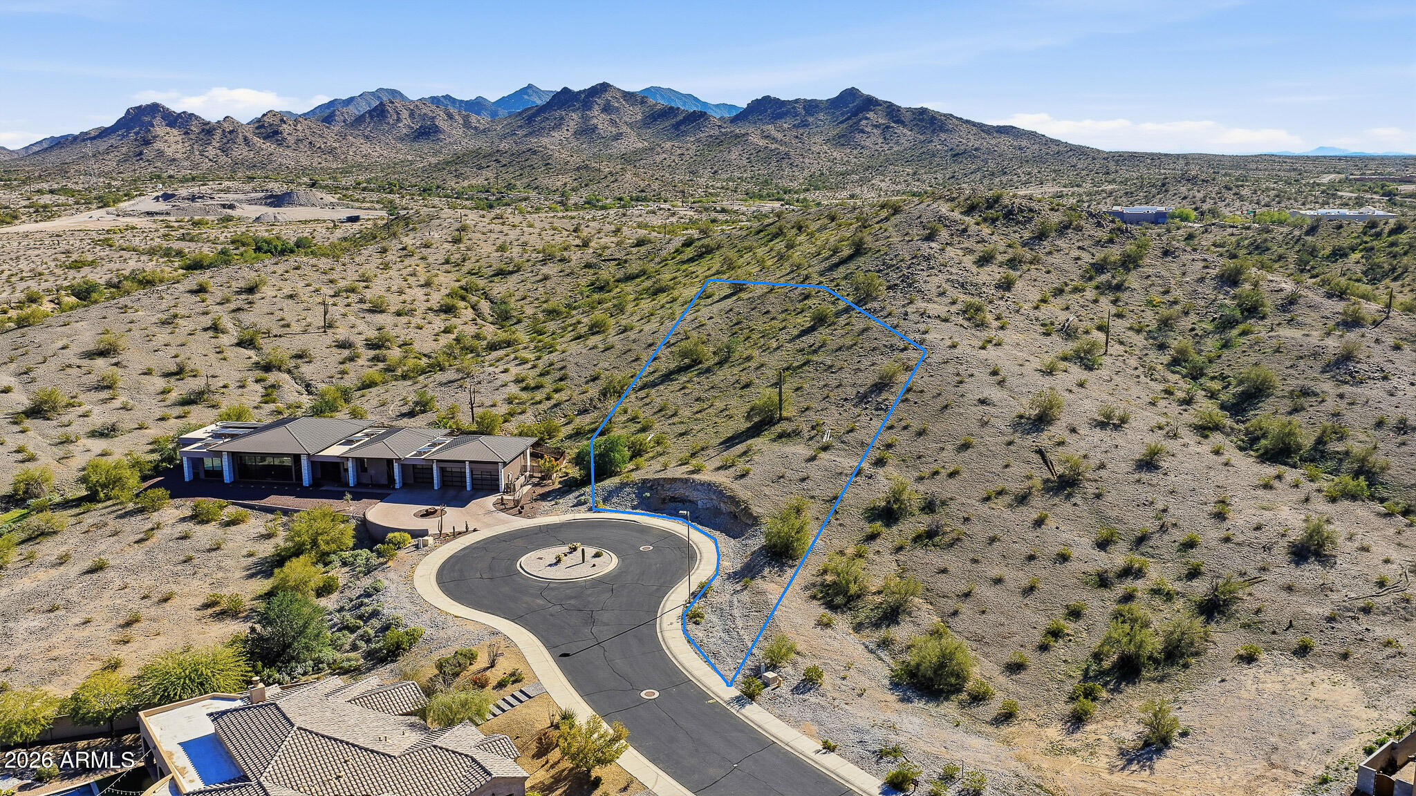Welcome to your future Custom Home Lot! Largest lot in the exclusive and highly desirable Sonoran Vistas with all Estrella Mountain Ranch has to offer. Sitting on 3/4ac with incredible views, you have plenty of space to build the home of your dreams. Recent home sales in this gated community have sold for well over $1mil. This custom home site is conveniently located within minutes of shopping, dining, and easy access to all the great things happening in Goodyear!
