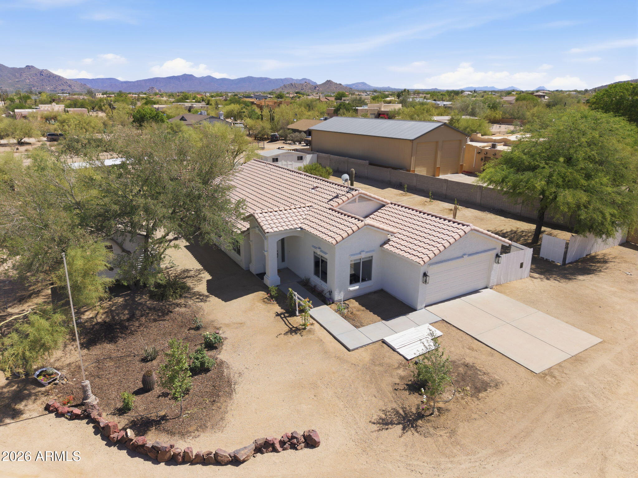 Discover this truly unique property designed for equestrian living, privacy, and versatility. Situated on a fully fenced lot, this property features a 3-bedroom, 2-bath home with stained concrete flooring, granite countertops, updated appliances, and distinctive custom finishes throughout.
Outdoor improvements make this property ideal for horse enthusiasts and those seeking additional usable space. The horse facilities include accommodations for two horses, automatic watering, wash area, and a generous turnout/exercise area located behind the residence. A separate tack room offers additional storage and potential for workshop use.The property also includes a charming treehouse that adds character and outdoor enjoyment. On the east side of the lot, there is a dedicated RV setup. Zone R-43.