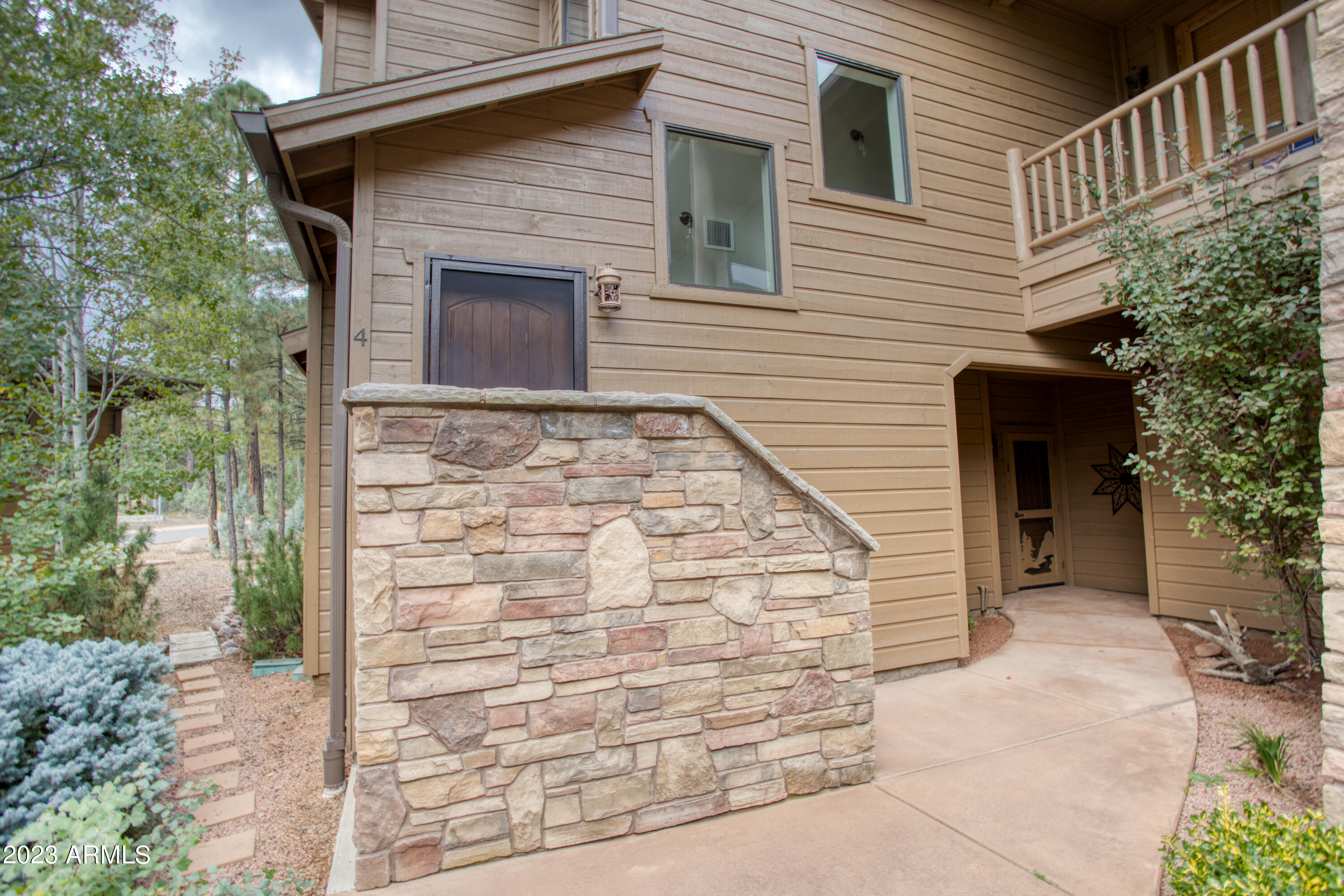 Wake up to the peaceful surroundings of your mountain retreat! Open your blinds to the pines! Great for a cozy home, investment property or summer get away! Light and bright, this nice home is being sold furnished. Recently remodeled. Ring doorbell; Nest thermostat, upgraded lighting fixtures, USB port outlets throughout. Has an inside staircase to the home on 2nd level. Open floor plan, nicely appointed, spacious and cozy. Two ensuites and full sized laundry. Large patio with views of the tall pines surrounding the area. Premier Torreon community has 2 Troon private courses, restaurants, fitness center, swimming pool, outdoor spa and activities for the whole family! Water, sewer, garbage included in HOA. Enjoy all the White Mountains have to offer!