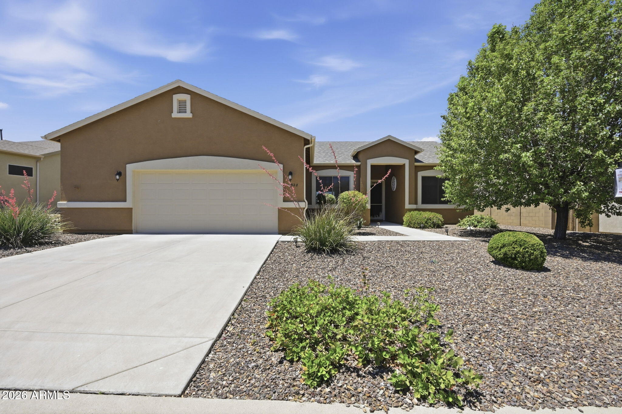 Views and much more!! Extra large garage, split plan, amazing views, and close to everything! Meticulously cared for home, with beautiful mature trees and landscaping, in popular Granville subdivision. Energy efficient gas furnace, gas water heater and gas fireplace (gas stub for gas stove), open concept, tile floor (carpet in the bedrooms), and covered rear patio with amazing views with no one directly behind, extra sunscreens for added insulation, prestige security door. Master suite features large walk-in shower, large walk-in closet, dual vanity, private toilet, and great views from the bedroom. Laundry room features cabinets and utility sink. Epoxy coated 2 1/2 car garage. Don't miss this great home!
