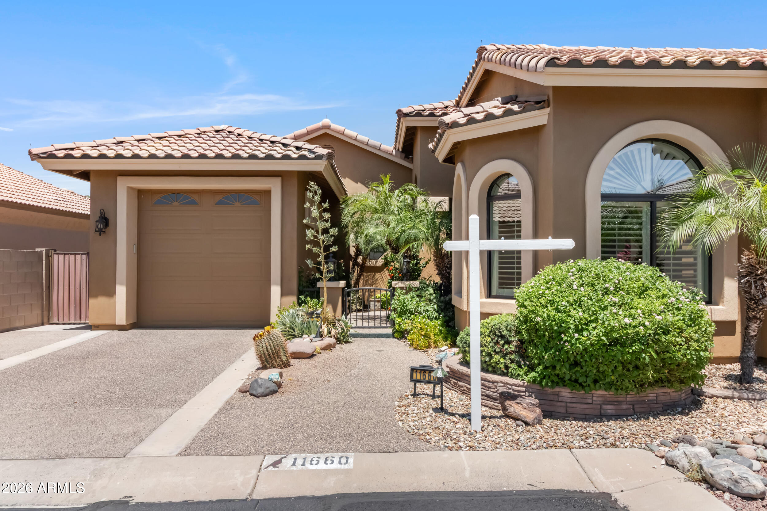 Stunning golf course home in Coyote Lakes,  offering 2,428 sqft. of total living space.  The main home features a gourmet kitchen and island with granite countertops, 3 bedrooms & 2.5 bathrooms.  A 377 sqft, 1 bedroom/1 bath casita is seamlessly connected to the main house by a covered patio.  The casita is ideal for multi-generational living, hosting guests or a private home office.  
The tranquil court-yard and covered patio is designed for true Arizona indoor-outdoor living featuring lush foliage with a garden-like setting, a relaxing water feature and a misting fan to keep you cool during warmer times.  The 2 car-tandem garage is temperature controlled and sides to the casita.  The bedrooms on the east end of the home open to  a patio overlooking beautiful golf course views!