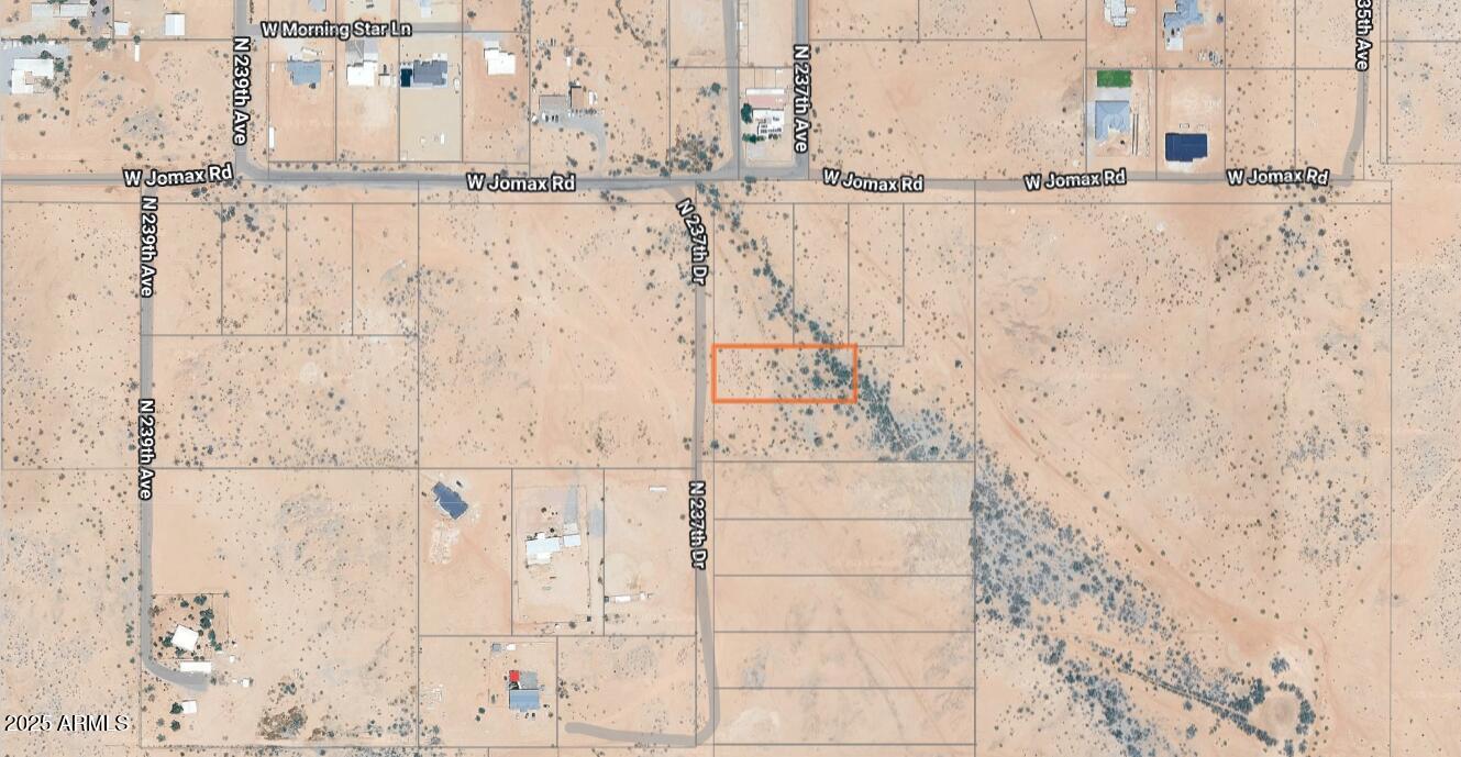 1 acre parcel - 2nd lot from corner of N 237th Ave & W Jomax Rd in West Surprise w/POWER at the POLE. Additional 4 parcels are available - 2 at 1 acre each, 1 at 1.47 acres & 1 flag lot w/ 4.22 acres & frontage on two streets.  Great opportunity for creating your horse property or for anyone seeking to create their own oasis or multi-use compound. Close enough to the city yet totally rural.  See the docs tab for recorded plat plan, Surprise zoning, & custom home plans. Additional parcels are 503-83-892, 503-83-893, 503-83-894 & 503-83-896. This land is outside the Luke AFB building restrictions and each lot has a buildable portion for a residence, outbuildings & casita above the flood flow zone. You can bundle parcels into one deal for up to 9 acres. Make your dream!