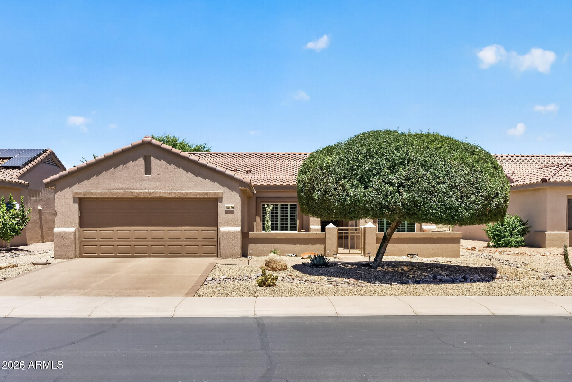 Beautifully maintained home w/sunset views from a front courtyard. Plantation shutters thruout. NEW ANDERSON WINDOWS (2014), NEW ROOF (4/2026), HVAC w/air cleaner (2019). Kitchen offers granite counters, dark cherry cabinets & rolling island cart. Enclosed den offers privacy & 3rd sleeping area. Owner's Suite features bay window, raised granite vanity, cultured marble shower & comfort-height Toto toilet. Guest bedroom may convey furnished. Updated hall bath has granite counter, inlaid sink, tub/shower & Toto raised toilet. Garage offers Kool Deck floor, cabinets, workbench, water softener, side door & water heater recirculation pump. Inside laundry has sink & storage. Upgraded insulation, including garage! Backyard features expanded Kool Deck patio, fountain & partial fence. Coated drive.