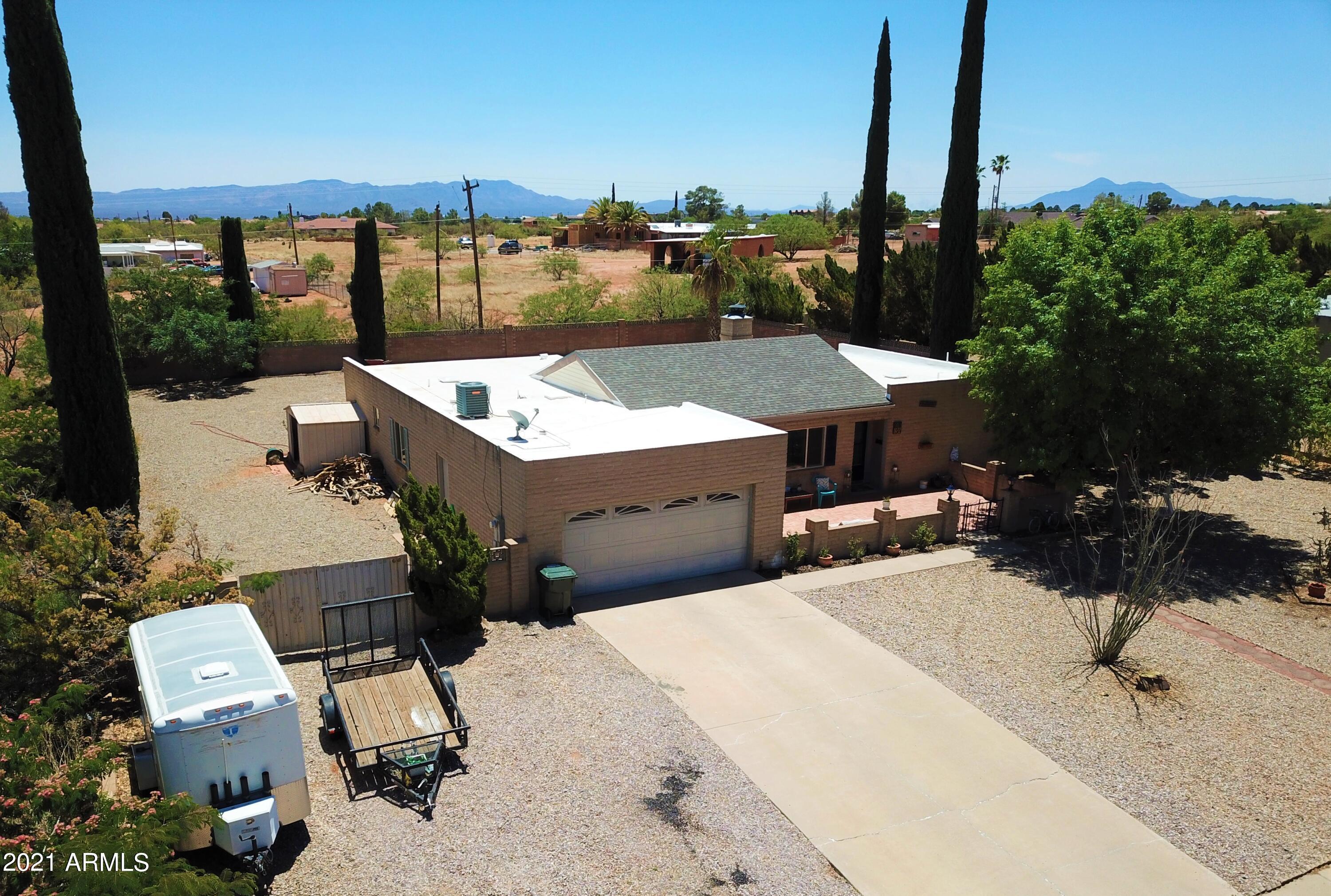 Spacious three bedroom two bath two car garage in great area with huge backyard with inground heated pool.  Split floorplan  with family room and living room.  Screened in patio, large inside laundry room.  Nice kitchen stainless steel appliances.  Must see.