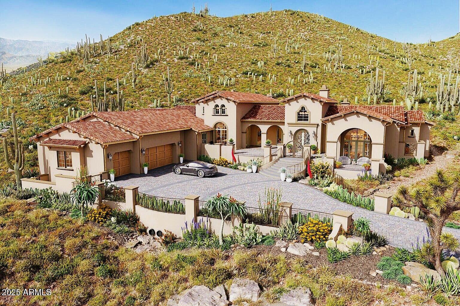 Luxury Custom Build Opportunity with Panoramic Mountain Views Create your dream home with this to-be-built 5-bedroom, 4.5-bath estate featuring a 7-car garage on a premium hillside lot overlooking the White Tank Mountains. Designed for elevated living, the plan includes refined finishes, custom cabinetry, and spacious interiors ideal for entertaining or everyday comfort. Tucked at the base of the mountains, the setting offers exceptional privacy while still enjoying the best of Verrado—tree-lined streets, top-rated schools, championship golf, resort-style pools, fitness center, miles of trails, and numerous parks. This is more than a home—it's a lifestyle.