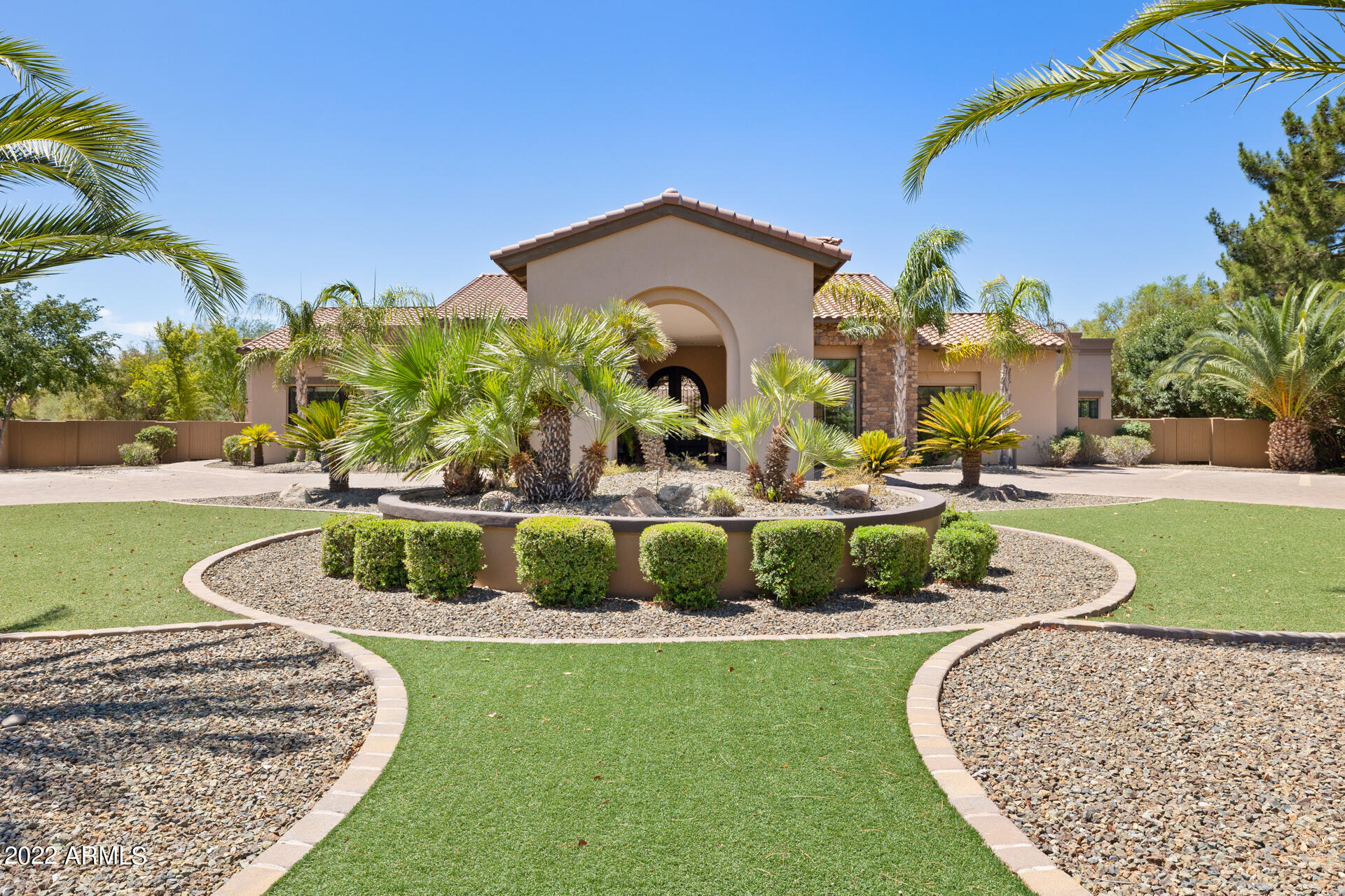 New to the market sits this one of a kind opportunity on a quiet residential street just south of the Shea corridor.  Custom built as a high end, state of the art assisted living, this private estate currently features 11 ensuite spacious bedrooms. Additionally you will find multiple gathering spaces, a home office, nail / hair salon and dining areas designed to flow in a perfect circle around a beautifully appointed outdoor space which can be viewed from every angle. The many large picture windows and arcadia doors lead to this lovely outdoor sitting area and contribute to an abundance of natural light.  Situated on almost an acre you'll also find a sprawling back covered patio, a Zen inspired walking path and impeccably kept grounds maintained and manicured with mature landscape. It's nice to have options and the tranquil ambiance of North Scottsdale makes for the perfect setting to re create a stunning private residence or continue along in the same group care fashion that has served many local families.