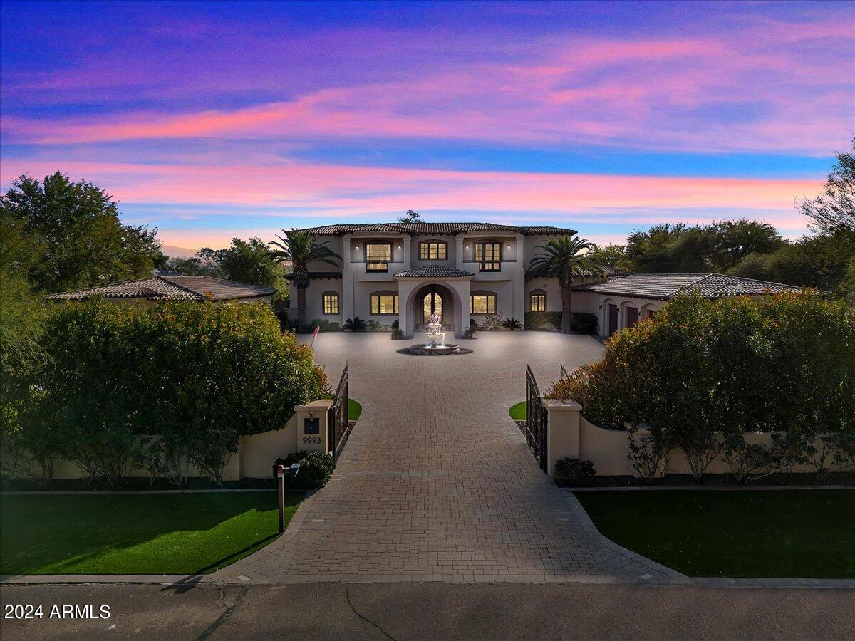Incredible opportunity to own this gorgeous Mediterranean Gated Estate on .996 acres in sought after Cactus Corridor built by Integrity Luxury Homes in 2012.  The home is being offered in as is condition BELOW what the seller paid for it 12/31/21.  The sellers loss is your gain!  Incredible views of the McDowells, a detached guest house, 5 car garage, fully owned solar, upstairs and downstairs master suites, 2400 square feet of covered patio, a dedicated work out room and so much more.