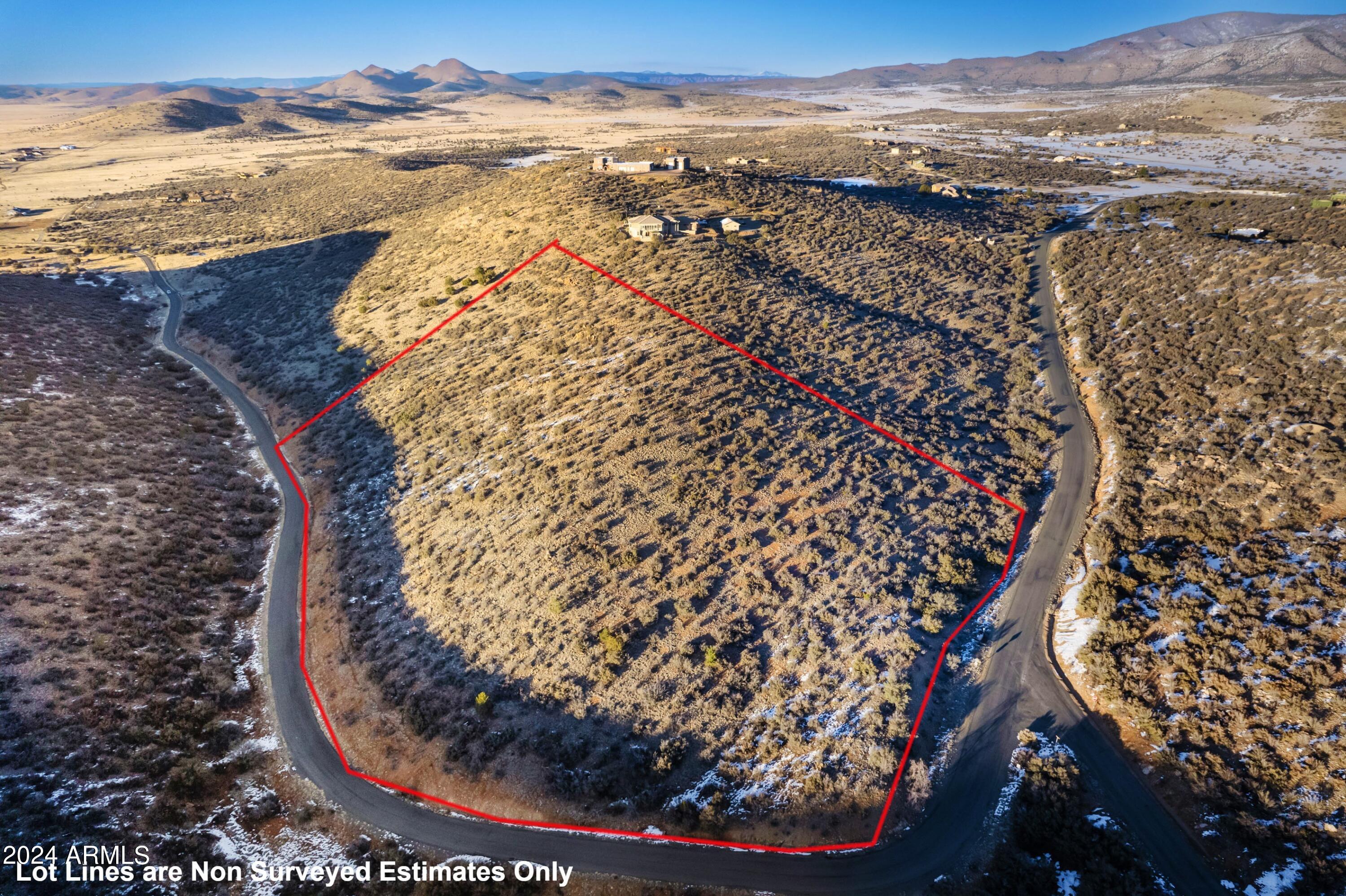 Here is another Excellent 12.18 Acre ~ VACANT Parcel in Prestigious/Gated PRESCOTT RIDGE with a 5 GPM Well and Lights Out 360 degree VIEWS. Prescott Ridge is ''The Best Kept Secret'' in all of the Prescott Region with 10 acre minimums, Gated, Paved Access, & Sensible CC&R's.