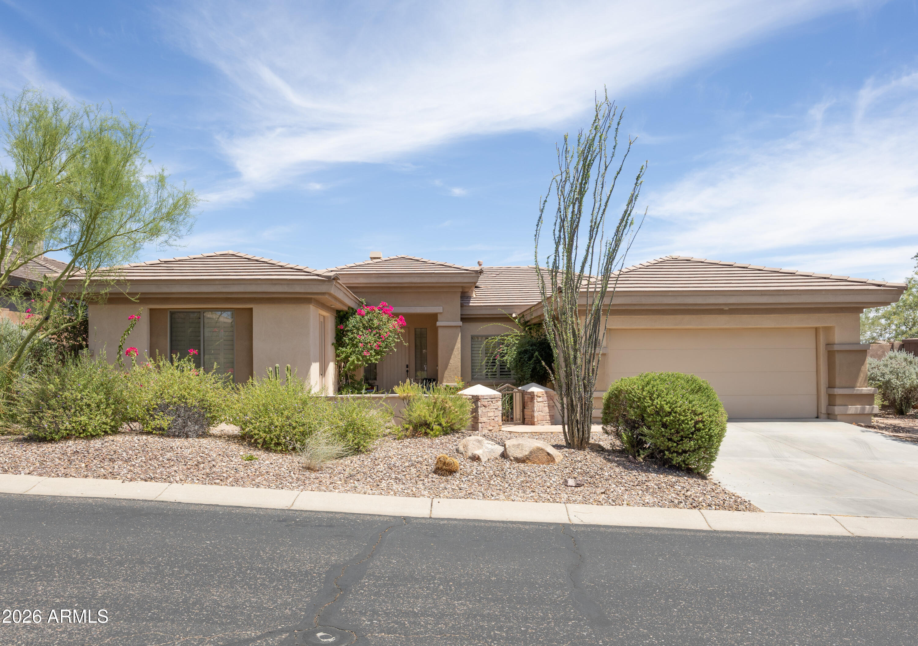 Pack your suitcase & toothbrush, because that is all you will need to enjoy this furnished 2 bedroom, Den, 2.5 bath home with Casita. 2,124 sf Main house has 2 bedrooms (King Sleep # Bed), 2 baths + 330sf Den/Casita w/ powder bath, built-in desk & shelves. In main house, you will find a Great Room with contemporary electric fireplace below the  mounted 72'' TV. Kitchen features Corian counters, electric cooktop, stainless wall oven & SubZero refrigerator. The backyard opens to a desert wash lot & has a covered flagstone patio, natural gas BBQ island and gas fireplace. $4,000/mon Nov-May, $2,800/mon June-Oct. $3,500/mon for 12 mon. One month minimum.  Internet Included, TV Streaming Only. Trash & landscaping included. Pets Landlord Approval. Amenity usage available with 6-month lease.