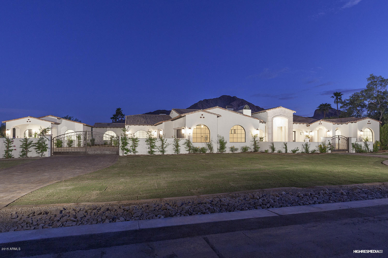BEAUTIFUL BRAND NEW BUILD, BREATHTAKING MOUNTAIN VIEWS FROM ALL WINDOWS LOCATED ON 1.11 ACRES  IN PARADISE VALLEYS MOST DESIRABLE LOCATION, THE LOT ALONE WAS ONE MIL. DOLLARS AND WORTH EVERY CENT GIVEN THE LOCATION AND VIEWS. HIGH END FINISHES THROUGHOUT WILL DELIGHT YOU. SEPARATE GUEST HOUSE, MAIN HOME HAS 5 FULL BDRMS. ENSUITE, SEPARATE OFFICE, FORMAL LIVING ROOM AND DINING ROOM, BUTLER PANTY, FABULOUS LAUNDRY WITH LOCKERS, FORMAL POWDER, HUGE FAMILY ROOM OPEN TO THE KITCHEN, ENORMOUS FRONT AND BACK ENTERTAINING PATIO'S WITH FIREPLACES, BBQ AREA. LUXURIOUS SPLIT MASTER WING. ALL OF THIS PLUS A SEPARATE AND ADDITIONAL ATTACHED CASITA MAKE THIS VERSATILE GATED ESTATE. LUSHLY LANDSCAPED, POOL AND SEPARATE RAMADA. THE LAST HOME THIS BUILDER FINISHED SOLD IN 2 WEEKS DON'T DELAY!!